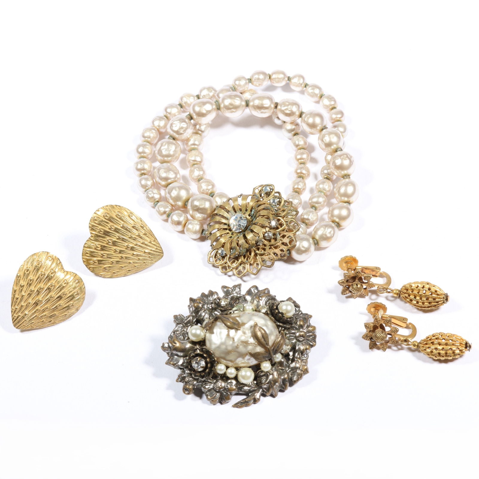 Miriam Haskell costume jewelry group including faux pearl bracelet and brooch with two pairs of gilt: Miriam Haskell costume jewelry group including faux pearl bracelet and brooch with two pairs of gilt metal earrings, all signed. 7"L x 1 3/8"W (bracelet)