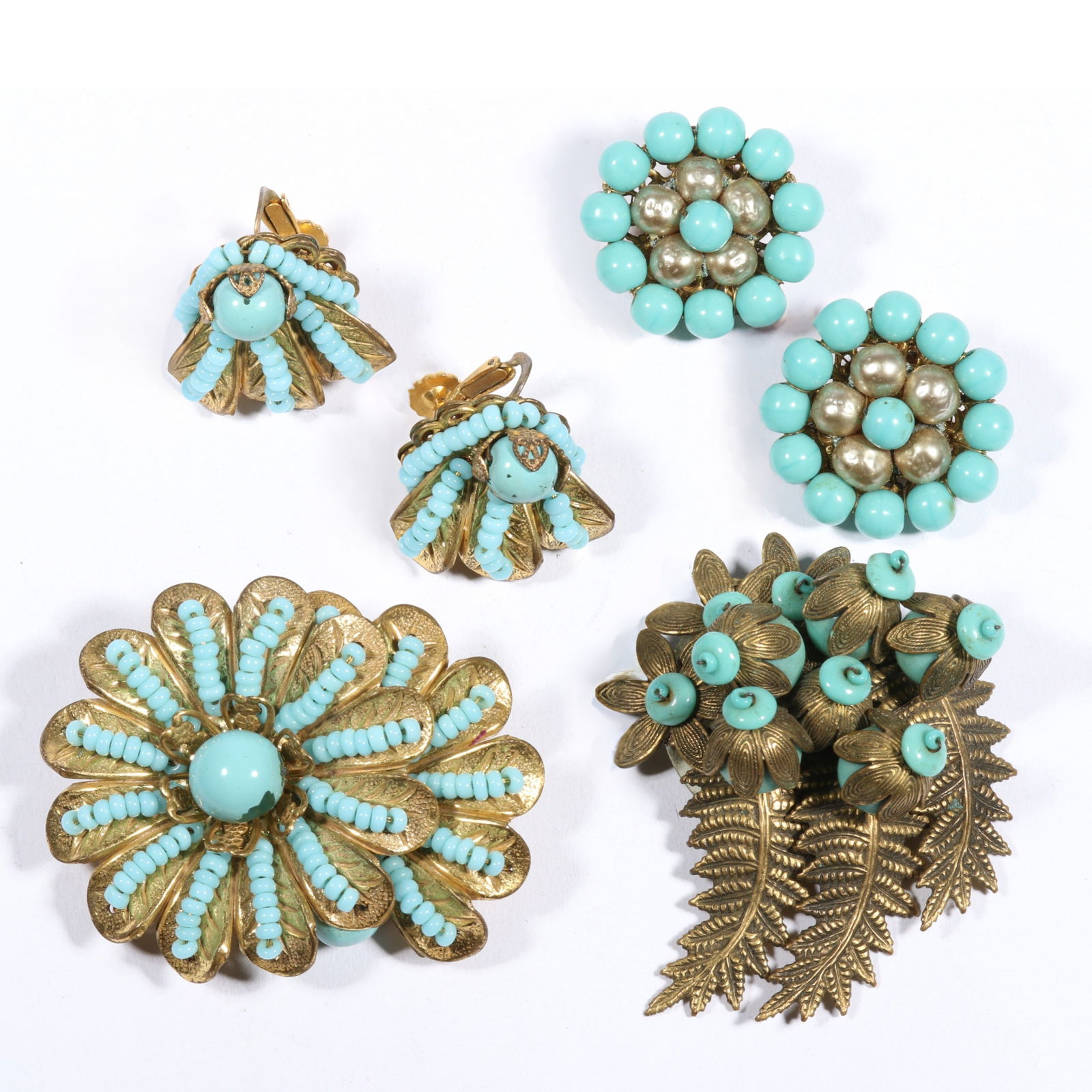 Miriam Haskell seafoam green costume jewelry group including floral brooch and matching earrings,: Miriam Haskell seafoam green costume jewelry group including floral brooch and matching earrings, unsigned early Haskell dress clip, and beaded faux pearl earrings. 1 3/4"H x 2 1/8"W (brooch)