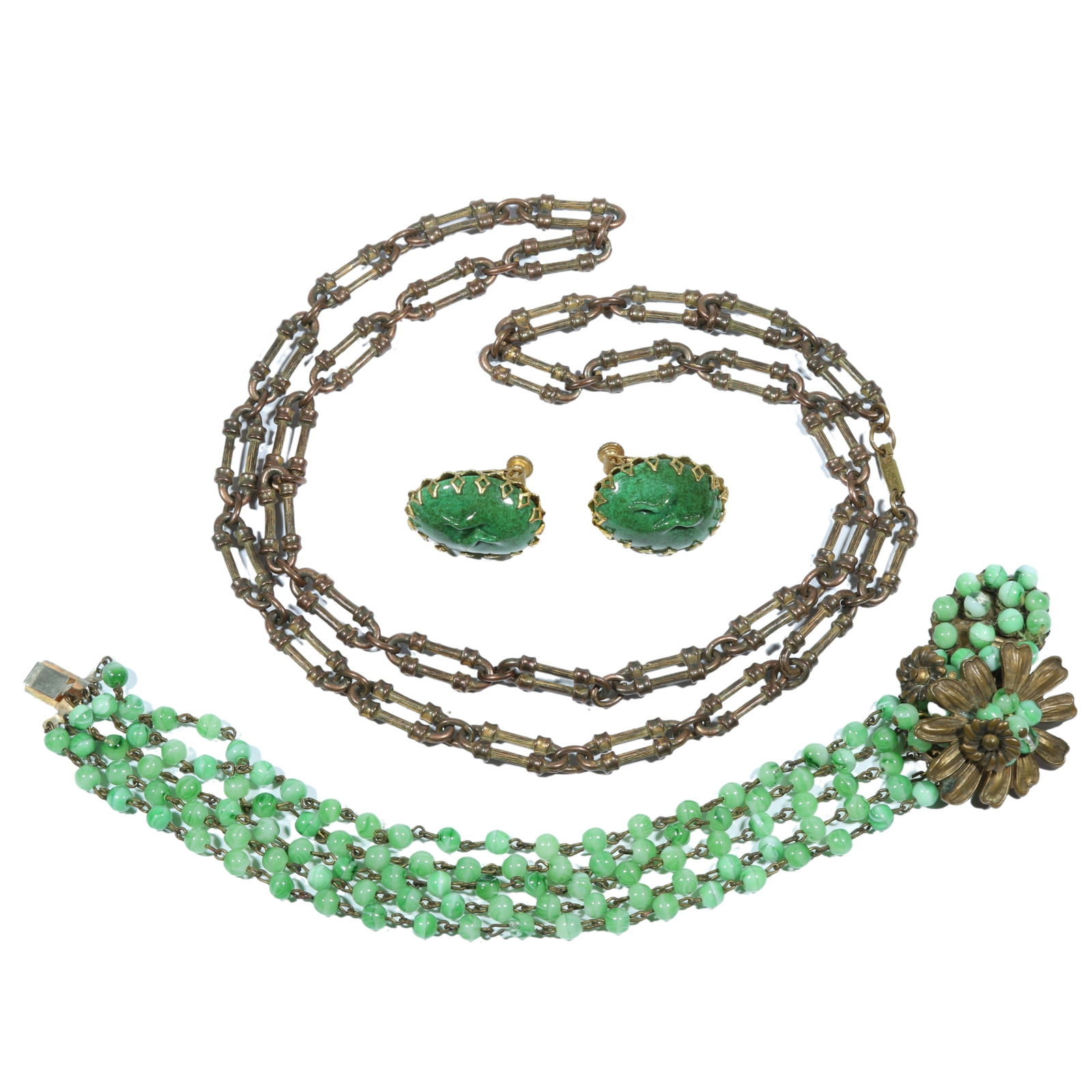 Miriam Haskell jewelry group including early unsigned green swirl art glass floral clasp bracelet: Miriam Haskell jewelry group including early unsigned green swirl art glass floral clasp bracelet with chain link necklace and art glass earrings. 8 1/4"L x 1 3/8"W (Bracelet)