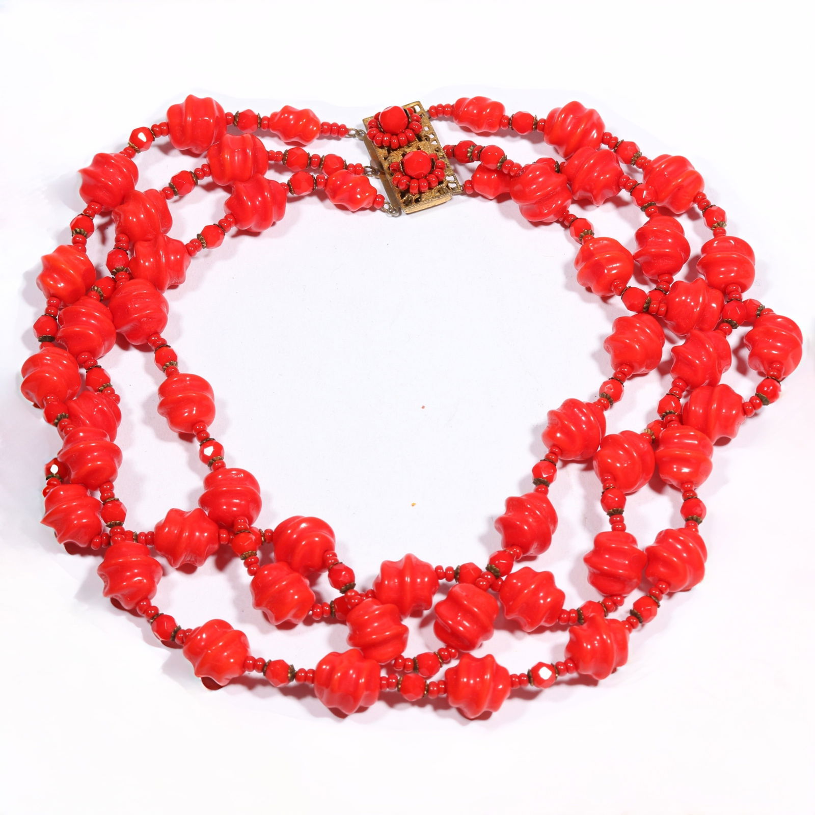 Miriam Haskell vermillion red beaded triple strand necklace with ornate beaded clasp. 15 1/2'L x 1: Miriam Haskell vermillion red beaded triple strand necklace with ornate beaded clasp. 15 1/2"L x 1 1/4"WProvenance: Inga Levin at Queensantiques LL collection