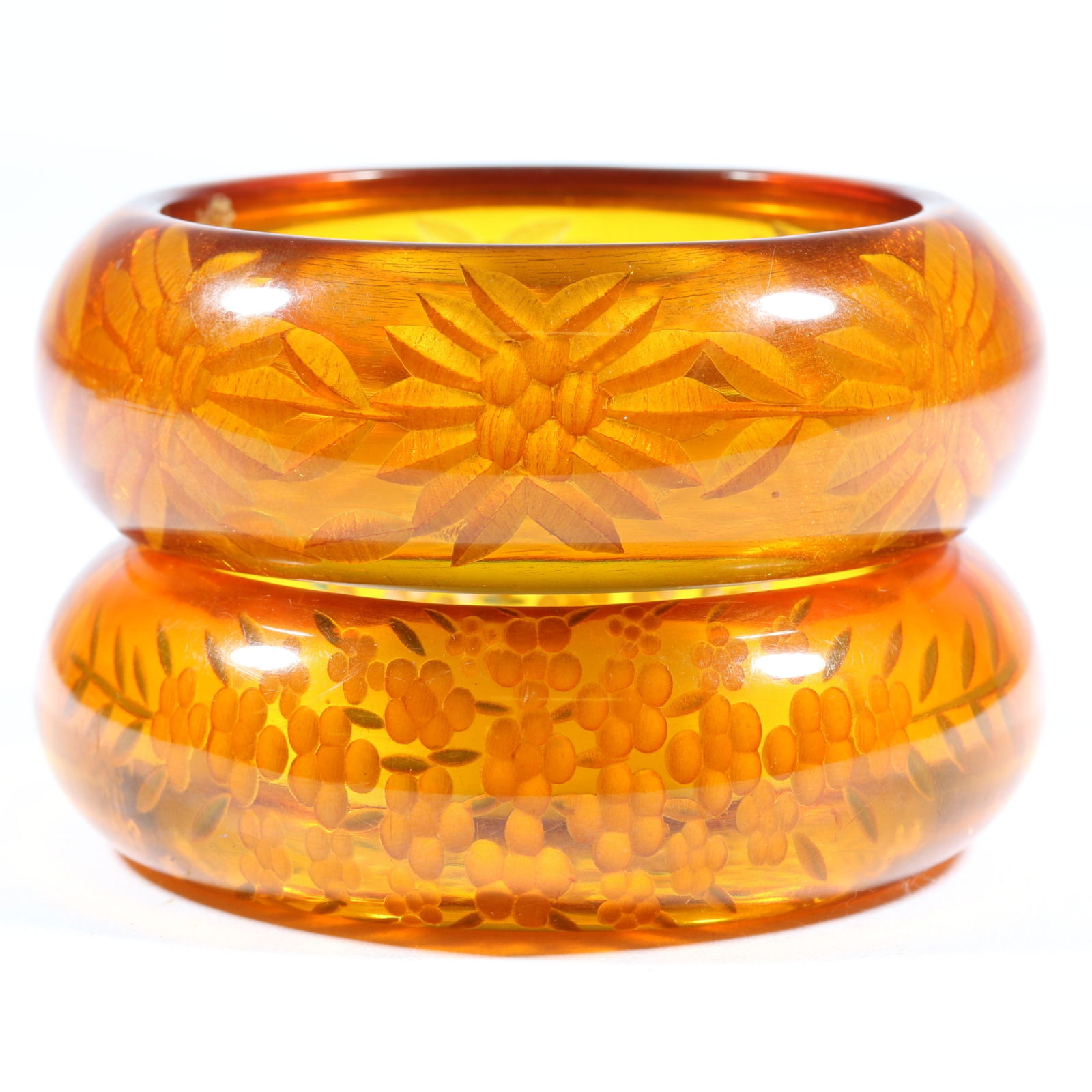 Vintage pair of chunky apple juice Bakelite bangle bracelets with reverse carved and painted flower (1 of 11)
