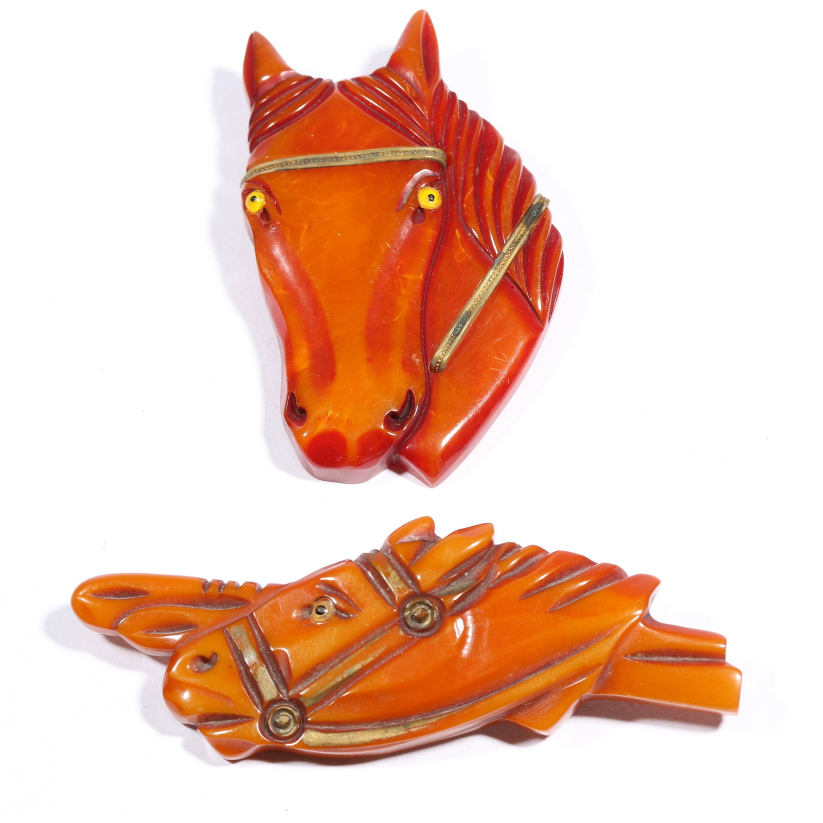 Vintage Equestrian horse butterscotch and marbled Bakelite brooches. 3 1/8'H x 2'W (largest) (1 of 10)