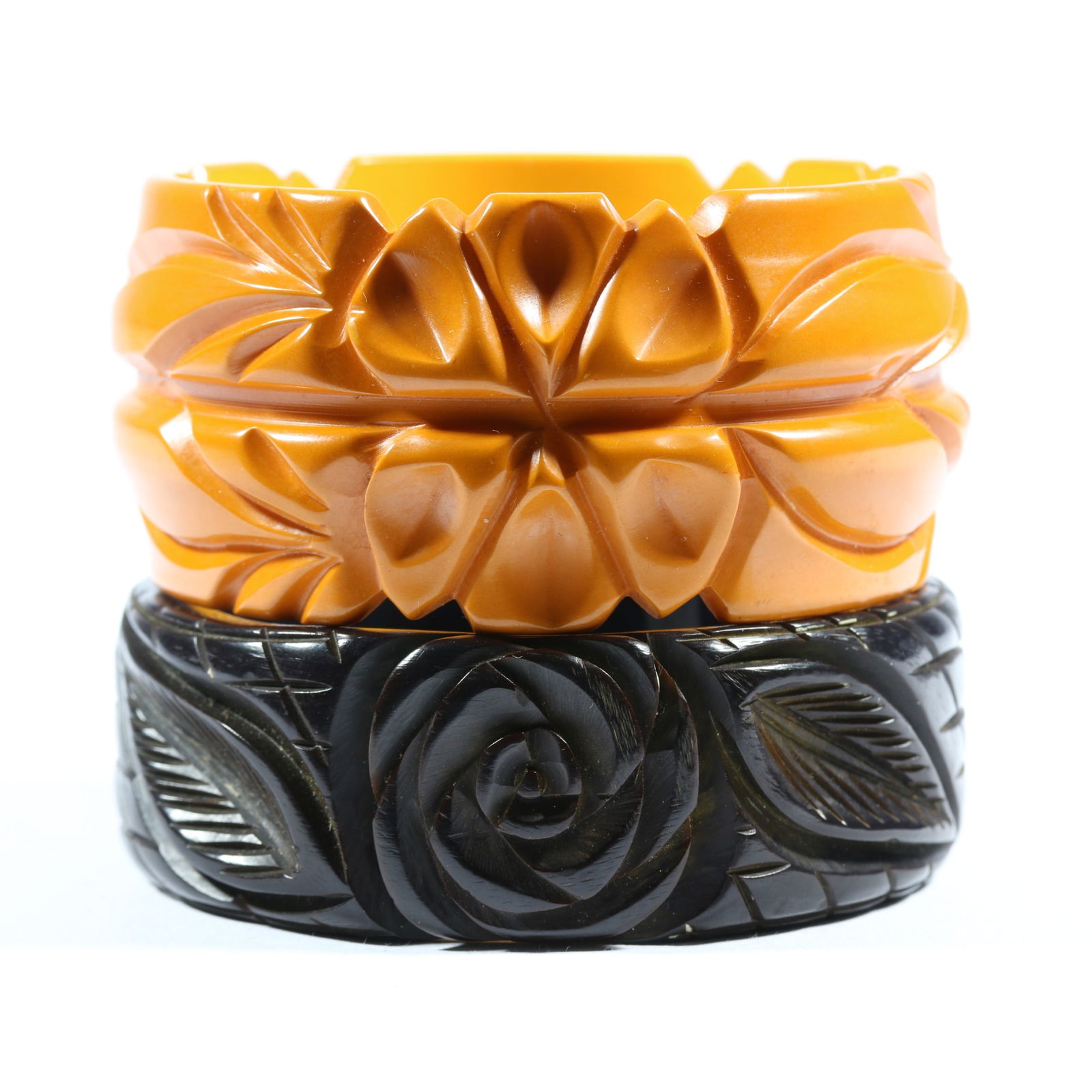 Pair of deeply carved floral Bakelite bangle bracelets. 1 1/2'H x 2 1/2'Inner Diameter (yellow (1 of 8)