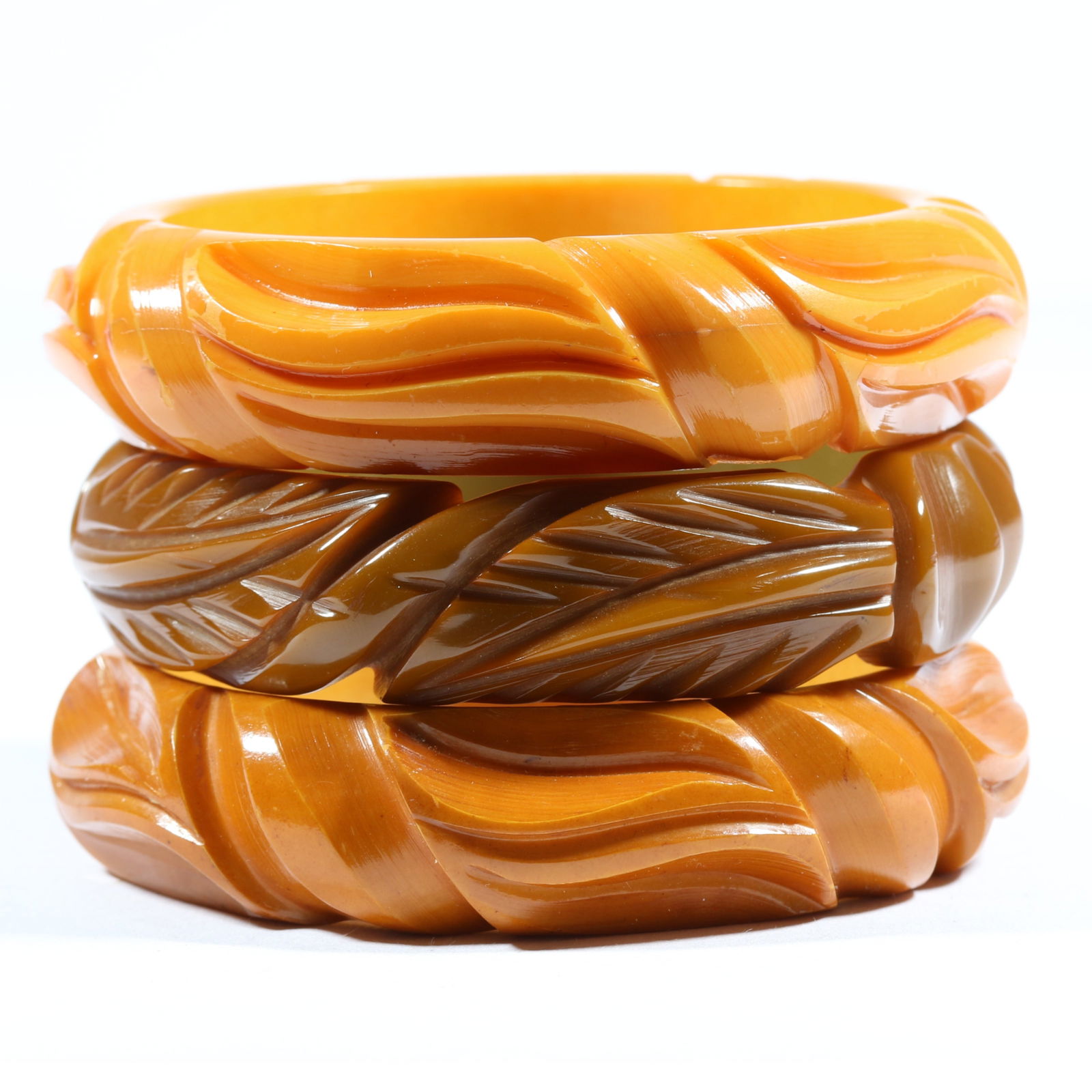 Vintage deeply carved Bakelite bangle bracelet stack. 3/4'H x 2 1/2'Inner Diameter (green bangle) (1 of 5)