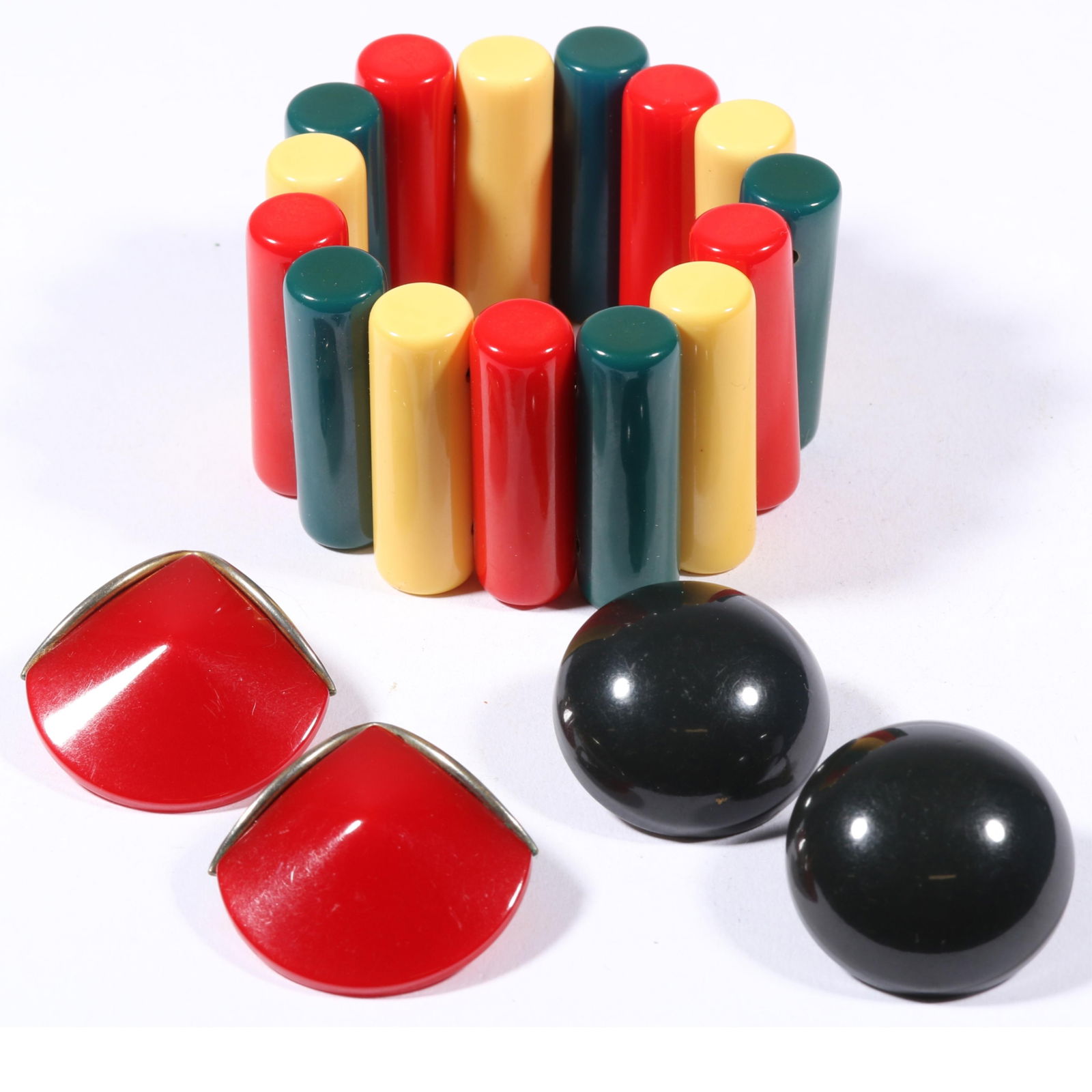 Vintage Bakelite jewelry group including Bakelite bar expansion bracelet with two pairs of earrings. (1 of 9)