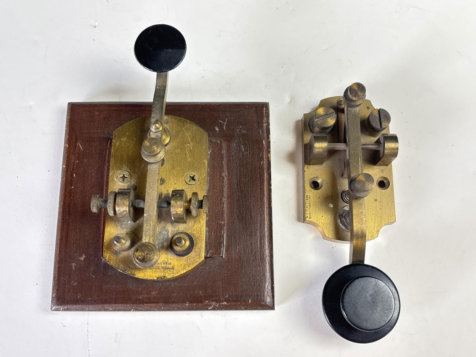Pair of vintage brass telegraph keys, marked ?Signal Electric Mfg. Co.? mounted on wood base and (1 of 6)