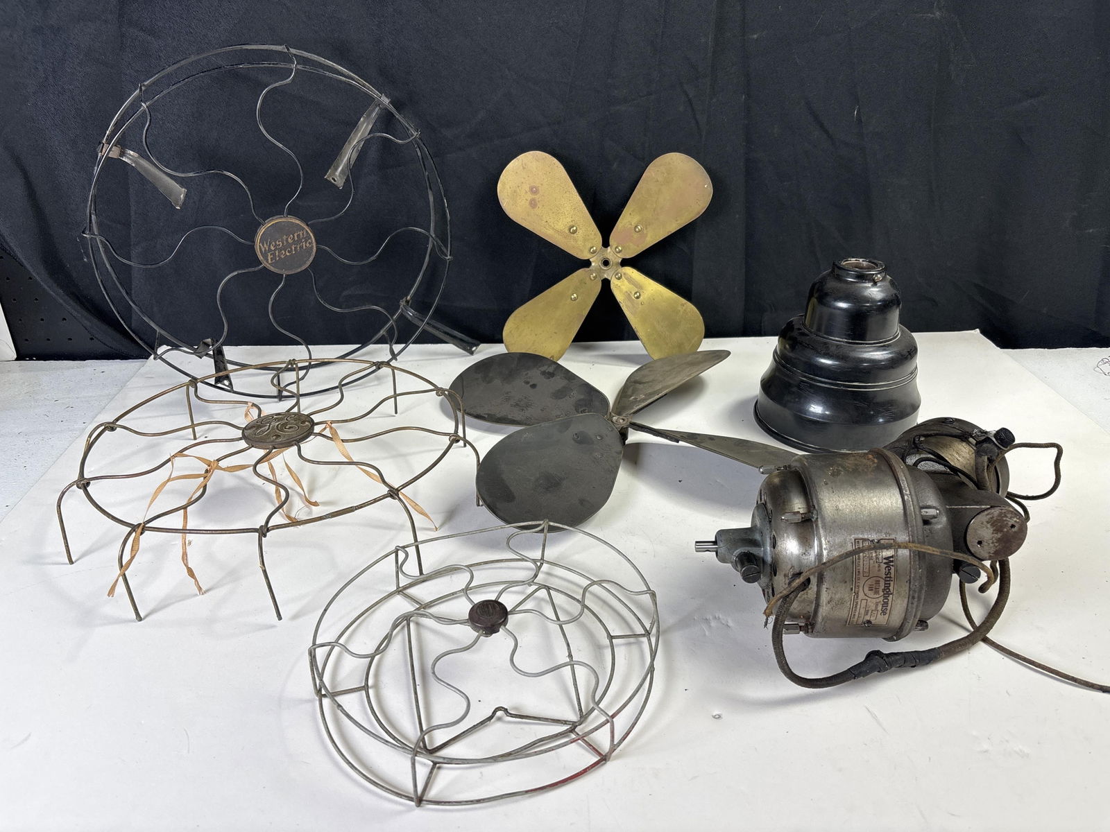 Lot of vintage fan parts, 3 cages, Western Electric, General Electric, Barcol, 2 sets of blades,: Lot of vintage fan parts, 3 cages, Western Electric, General Electric, Barcol, 2 sets of blades, base cover, Westinghouse Rotaire Fan motor style 517088 A