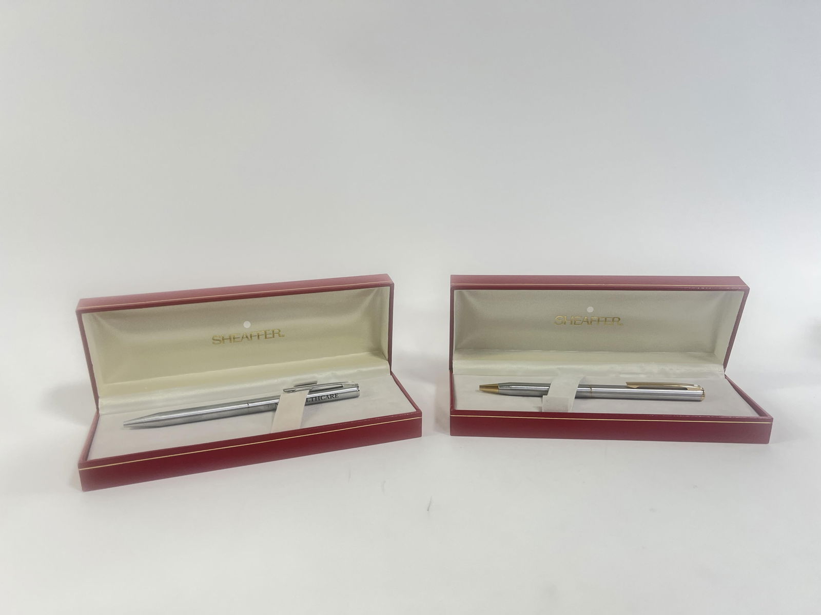 Pair of stainless steel? white dot Sheaffer pens: Pair of stainless steel? white dot Sheaffer pens, one with the inscription ?NCS Healthcare? in decorative boxes