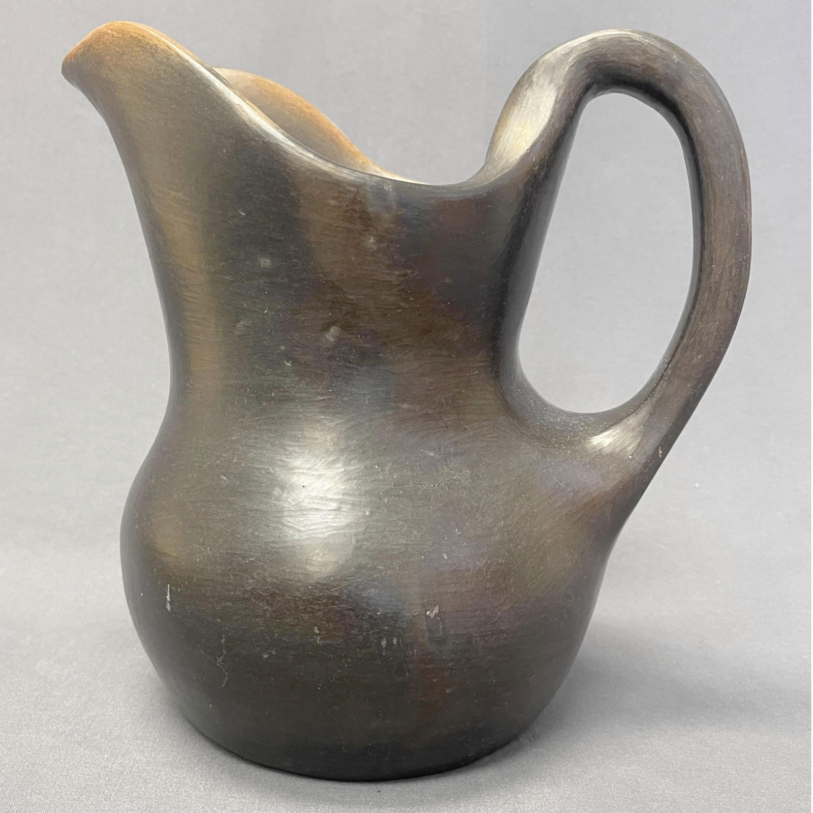 Faye and George Greiner Catawba pottery pitcher, 9" tall, 10" deep from spout to handle, 8" wide (1 of 9)