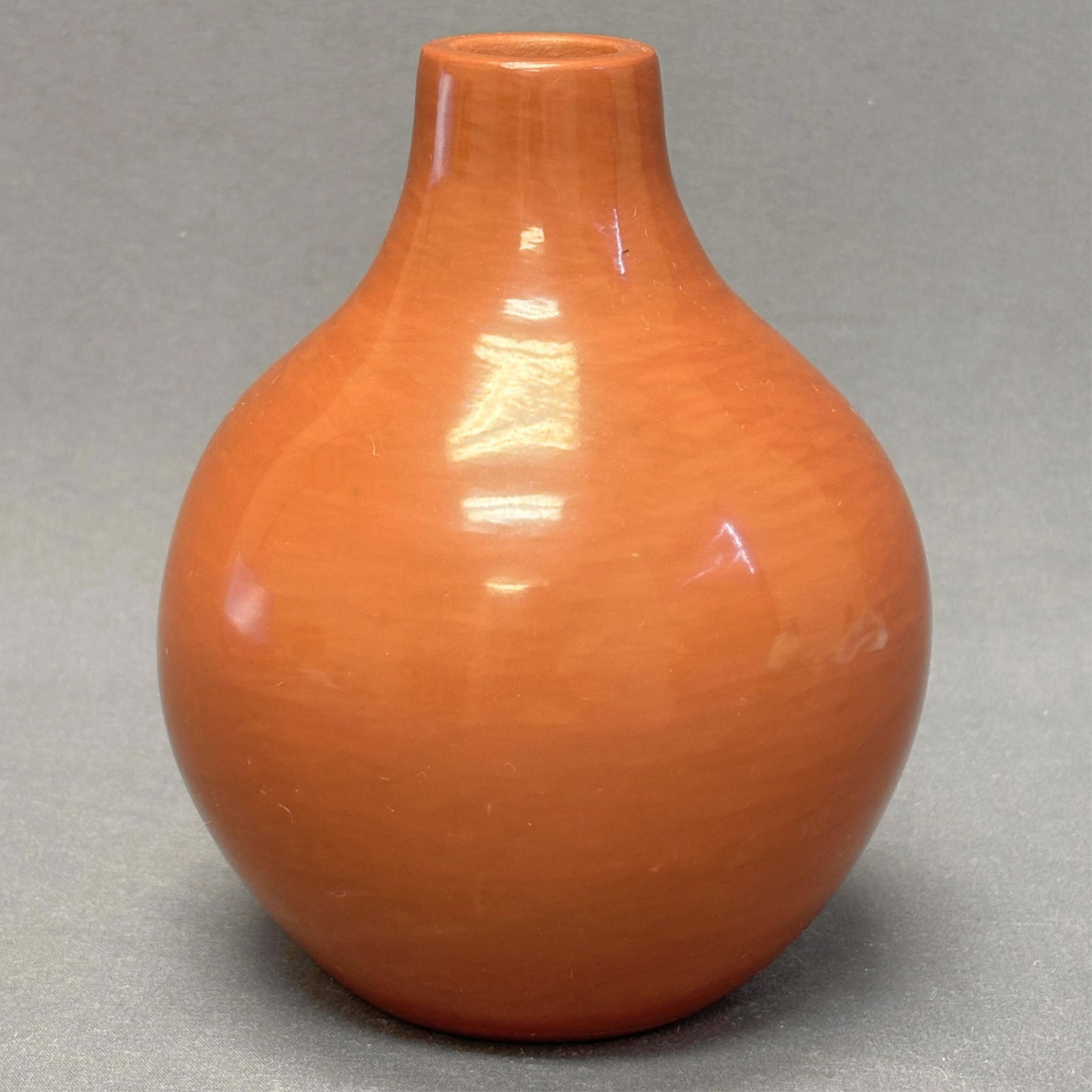 Irene Tse Pe, San Ildefonso Pueblo red polished vase 6" high x 4" wide x 1" diameter at mouth (1 of 6)