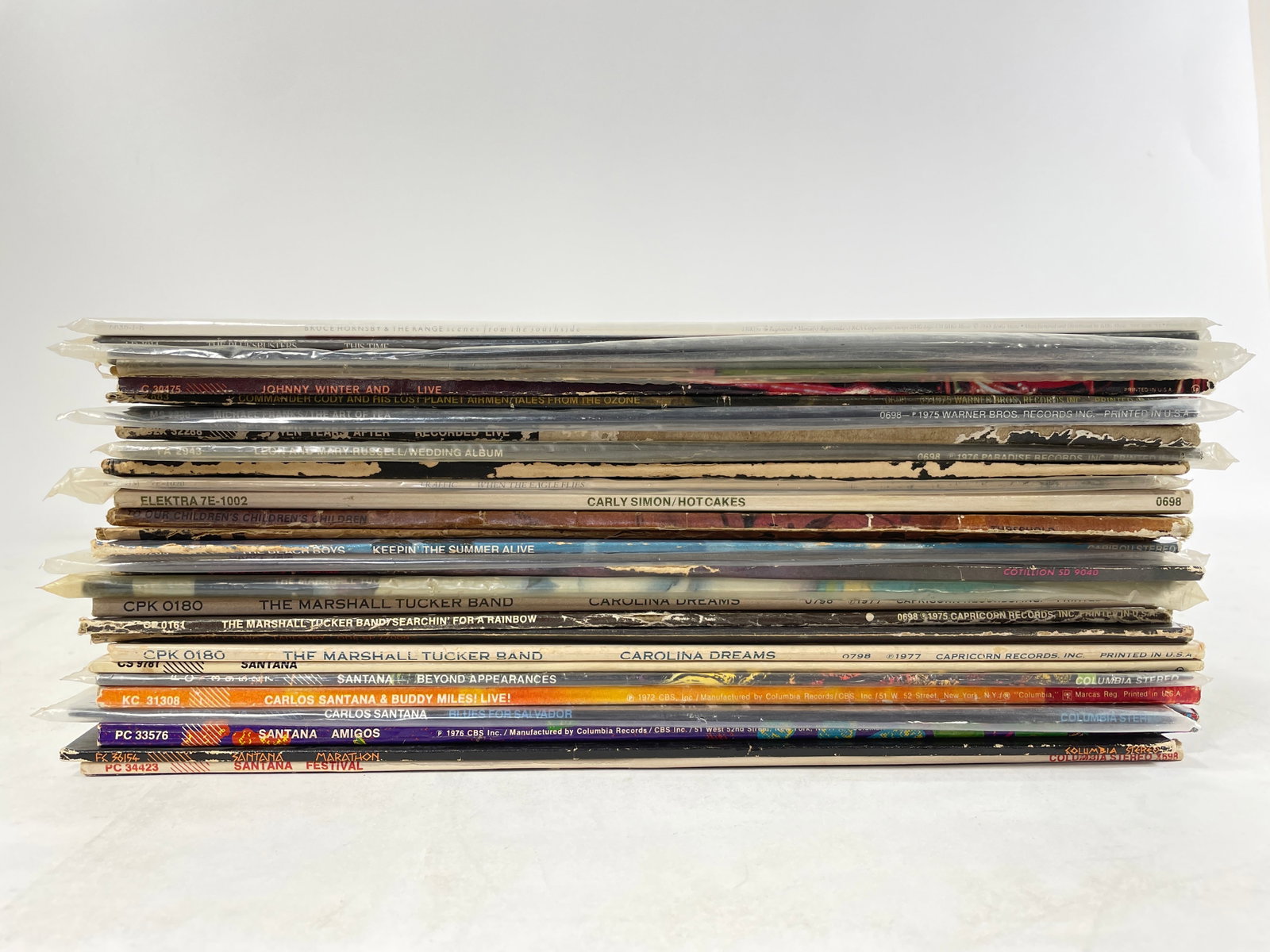 Opportunity Lot of 29 vinyl records by various artists: Opportunity Lot of 29 vinyl records by various artists A collection of vinyl records featuring various artists. Includes albums such as Johnny Winter's 'Live', Carly Simon's 'Hotcakes', The Marshall T
