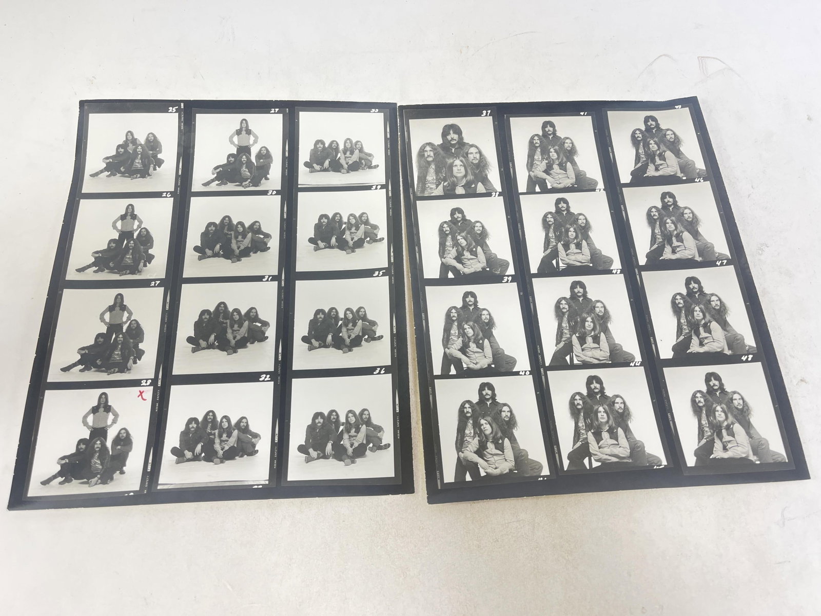 Pair of rare / unseen Black Sabbath contact sheets on white background, with Ozzy Osbourne, Geezer: Pair of rare / unseen Black Sabbath contact sheets on white background, with Ozzy Osbourne, Geezer Butler, Tony Iommi, Bill Ward Provenance: Connie DeNave Estate