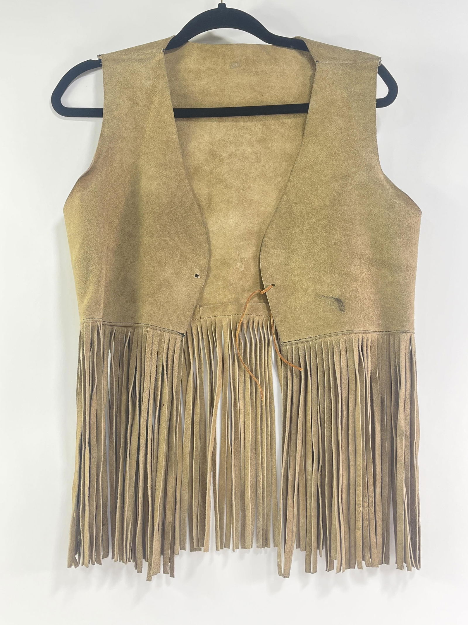 ALLEGED, UNCONFIRMED vest purported to have belonged to Jimi Hendrix, ALLEGEDLY worn by Jimi Hendrix: ALLEGED, UNCONFIRMED vest purported to have belonged to Jimi Hendrix, ALLEGEDLY worn by Jimi Hendrix in Hawaii Provenance: Connie DeNave Estate