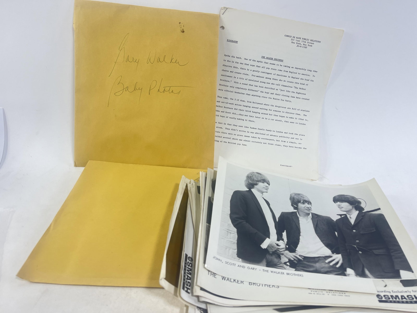 Box / Opportunity lot of The Walker Brothers photos, Biographies, two sealed envelopes of baby: Box / Opportunity lot of The Walker Brothers photos, Biographies, two sealed envelopes of baby photos Provenance: Connie DeNave Estate