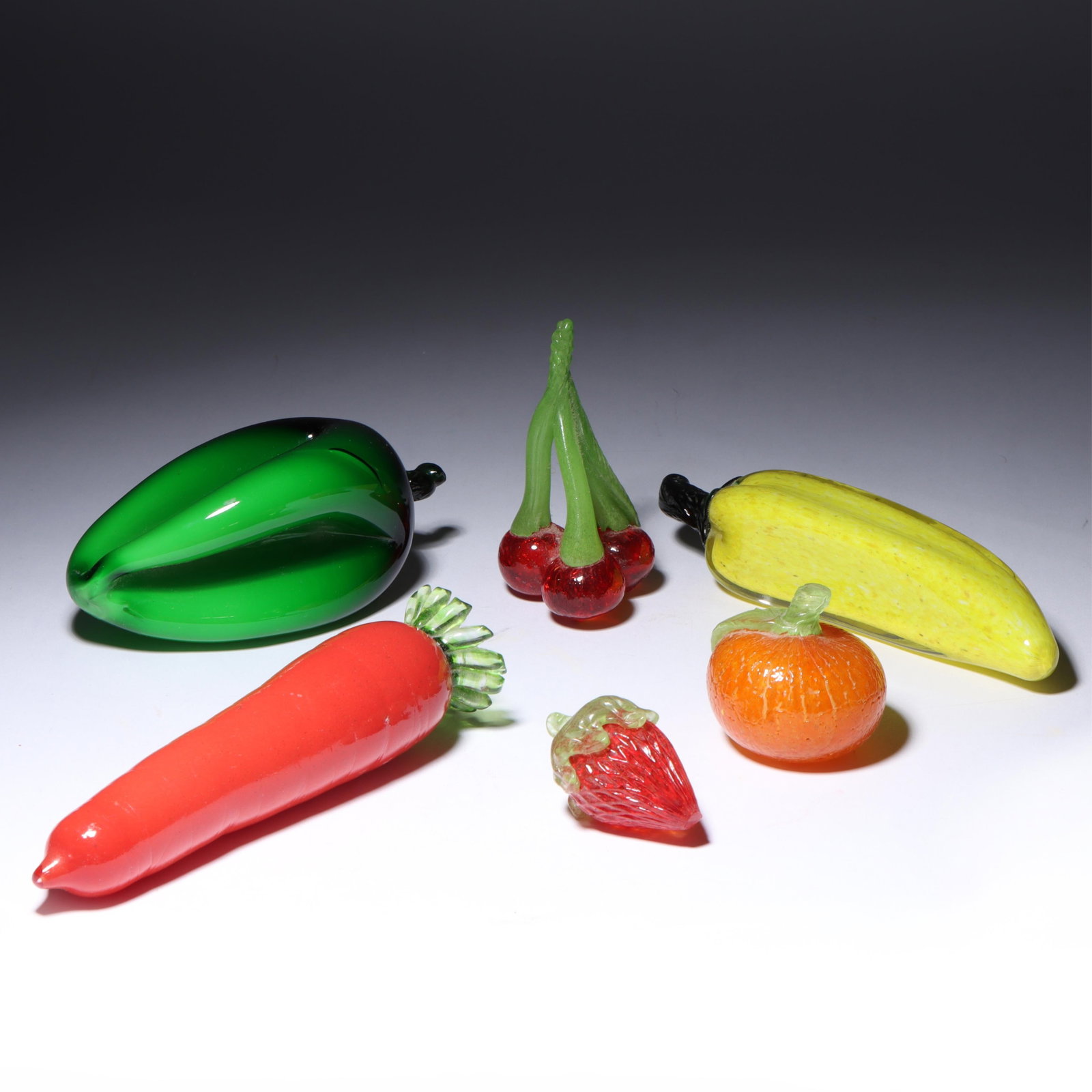 Murano art glass fruit and vegetables, 6pc: Murano art glass fruit and vegetables, 6pc Carrot with Pauly & Co. label, green pepper, cherries, strawberry, citrus, and banana.