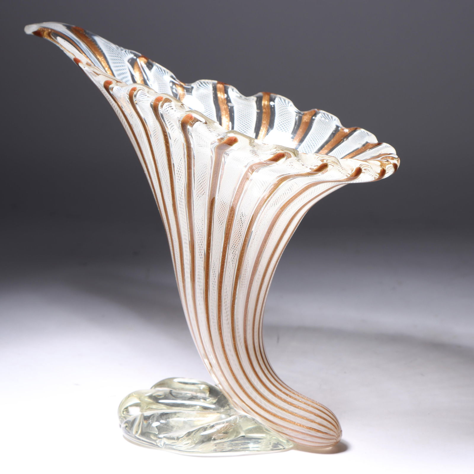 Murano Filigrana art glass cornucopia vase 9 1/4"H x 10"W: Murano Filigrana art glass cornucopia vase with copper aventurine. 9 1/4"H x 10"W