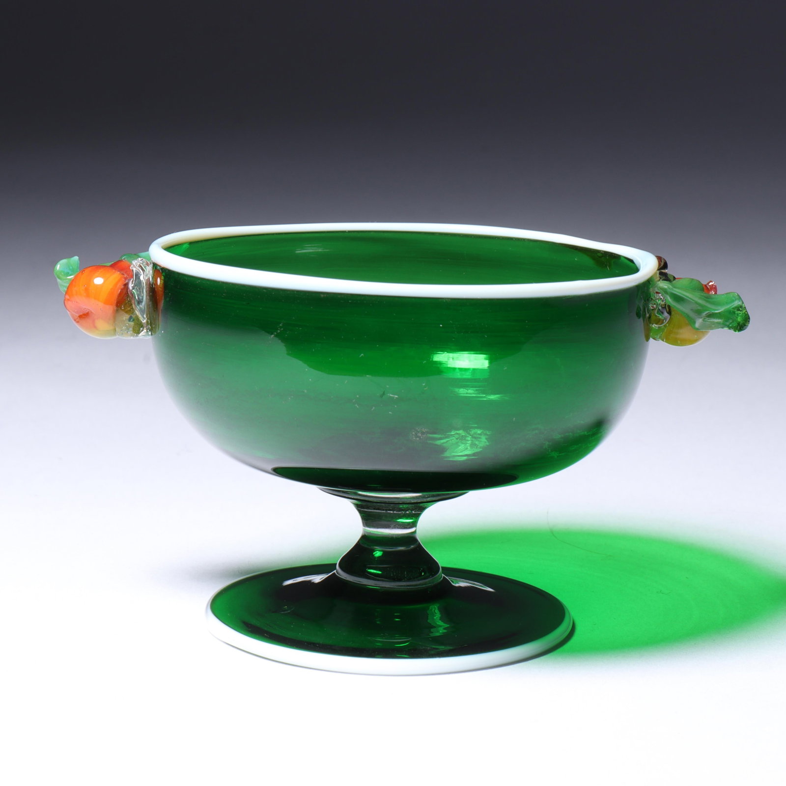 Maestri Vetrai Muranesi (MVM) Murano Cappellin open salt bowl in green with applied fruit 2"H x 3: Maestri Vetrai Muranesi (MVM) Murano Cappellin open salt bowl in green with applied fruit Provenance: Fort Wayne Museum of Art, Fort Wayne, Indiana. 2"H x 3 3/4"W