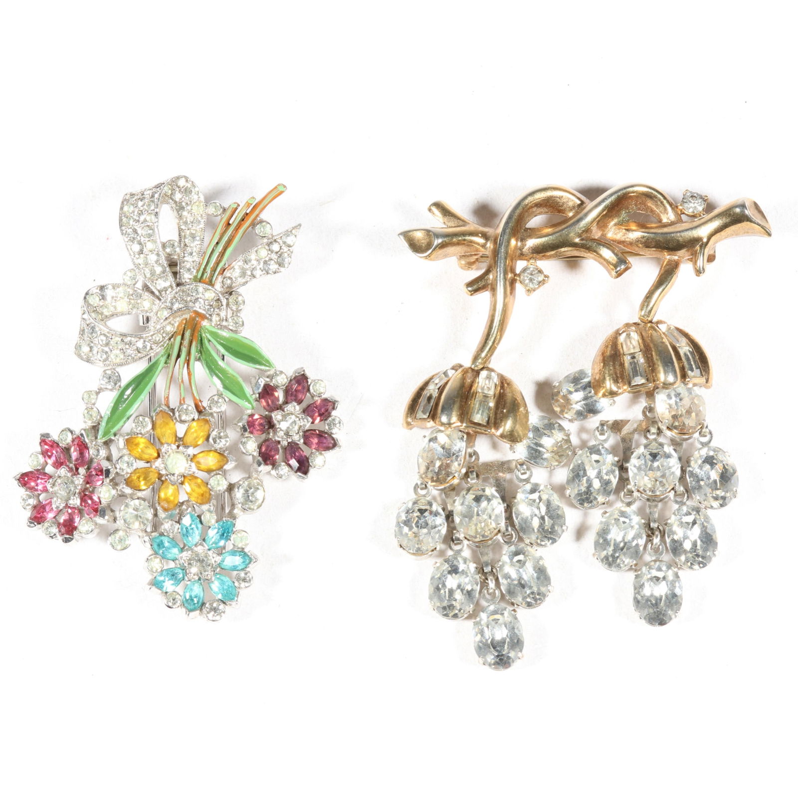 Crown Trifari rhinestone crystal floral brooch and fur clip. 2 3/8"H x 1 7/8"W (brooch): Crown Trifari rhinestone crystal floral brooch and fur clip. From the inventory of the former vintage costume jewelry business, "Aunt Tink", "seller of the collectible, the fun and the unique", owned