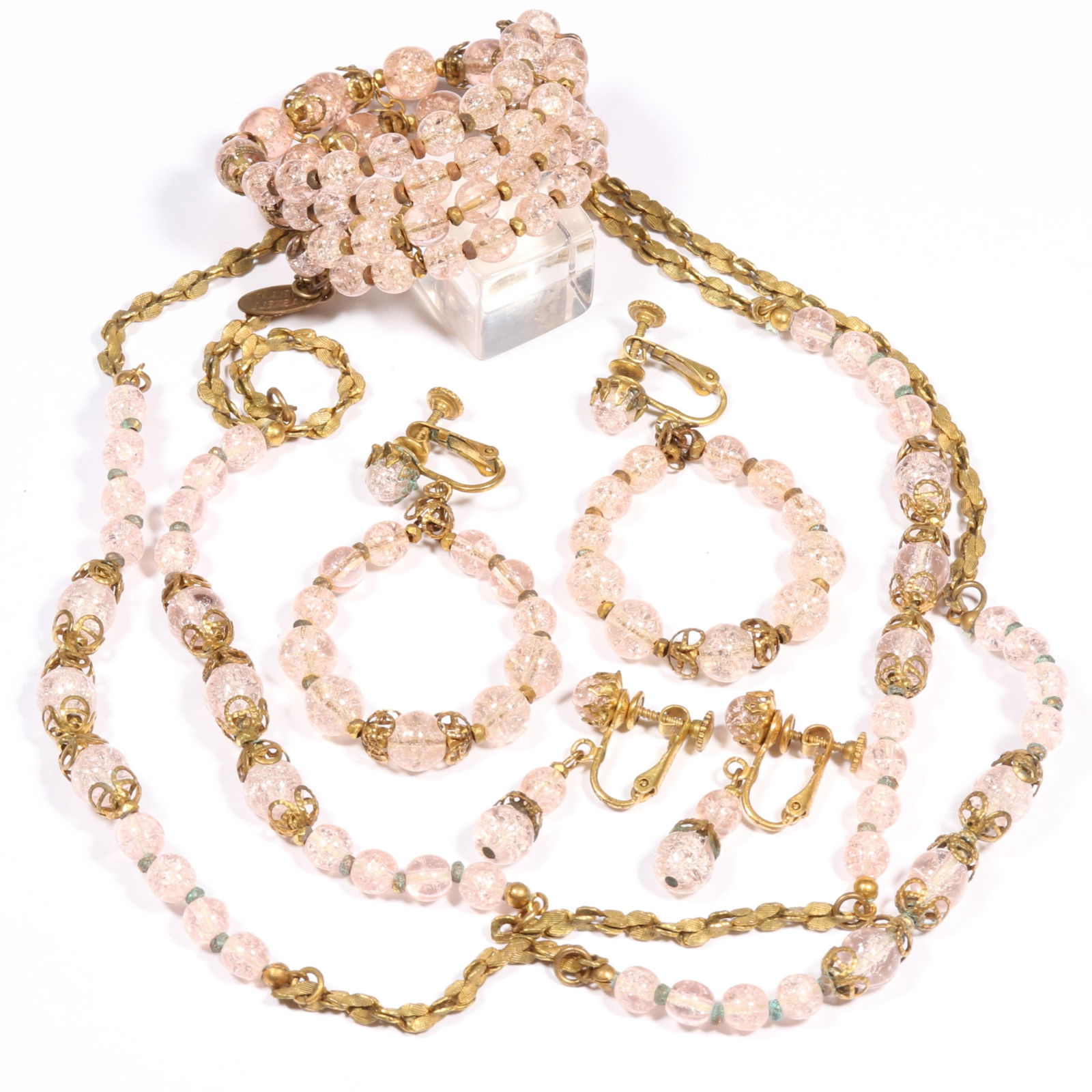 Miriam Haskell pink crackle glass parure including necklace, bracelet, and two pairs of earrings.: Miriam Haskell pink crackle glass parure including necklace, bracelet, and two pairs of earrings. 32"Long (necklace)