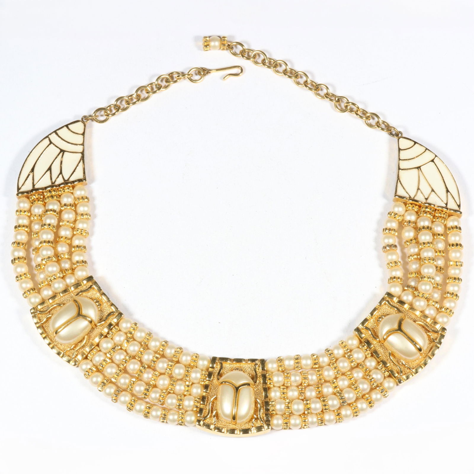 Hattie Carnegie Egyptian Revival pearl belly scarab necklace with faux pearl beads and white enamel: Hattie Carnegie Egyptian Revival pearl belly scarab necklace with faux pearl beads and white enamel accents. 16"L x 1 1/4"W