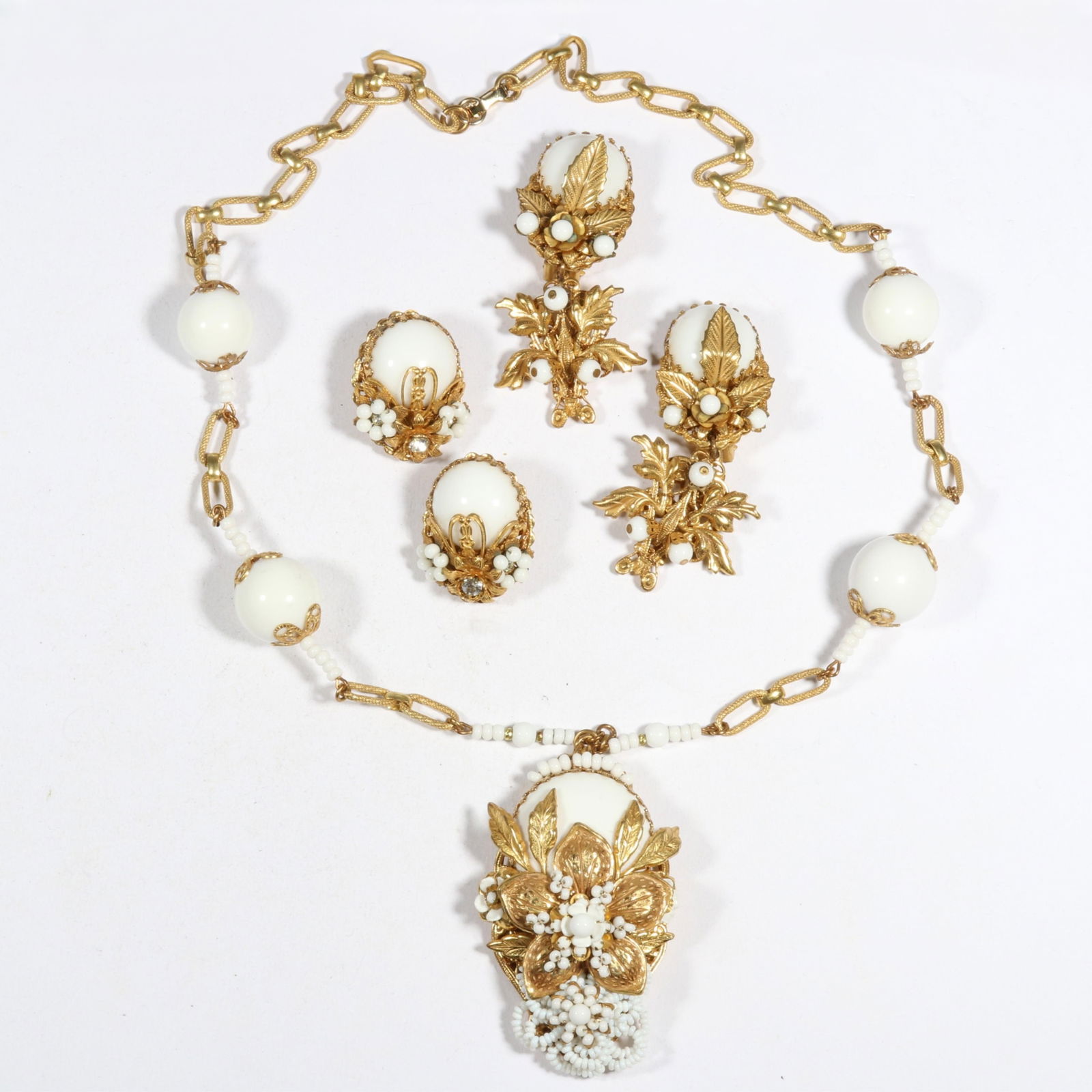 Stanley Hagler NYC matching white beaded jewelry group including necklace and two pairs of earrings.: Stanley Hagler NYC matching white beaded jewelry group including necklace and two pairs of earrings. Necklace unsigned. From the inventory of the former vintage costume jewelry business, "Aunt Tink",