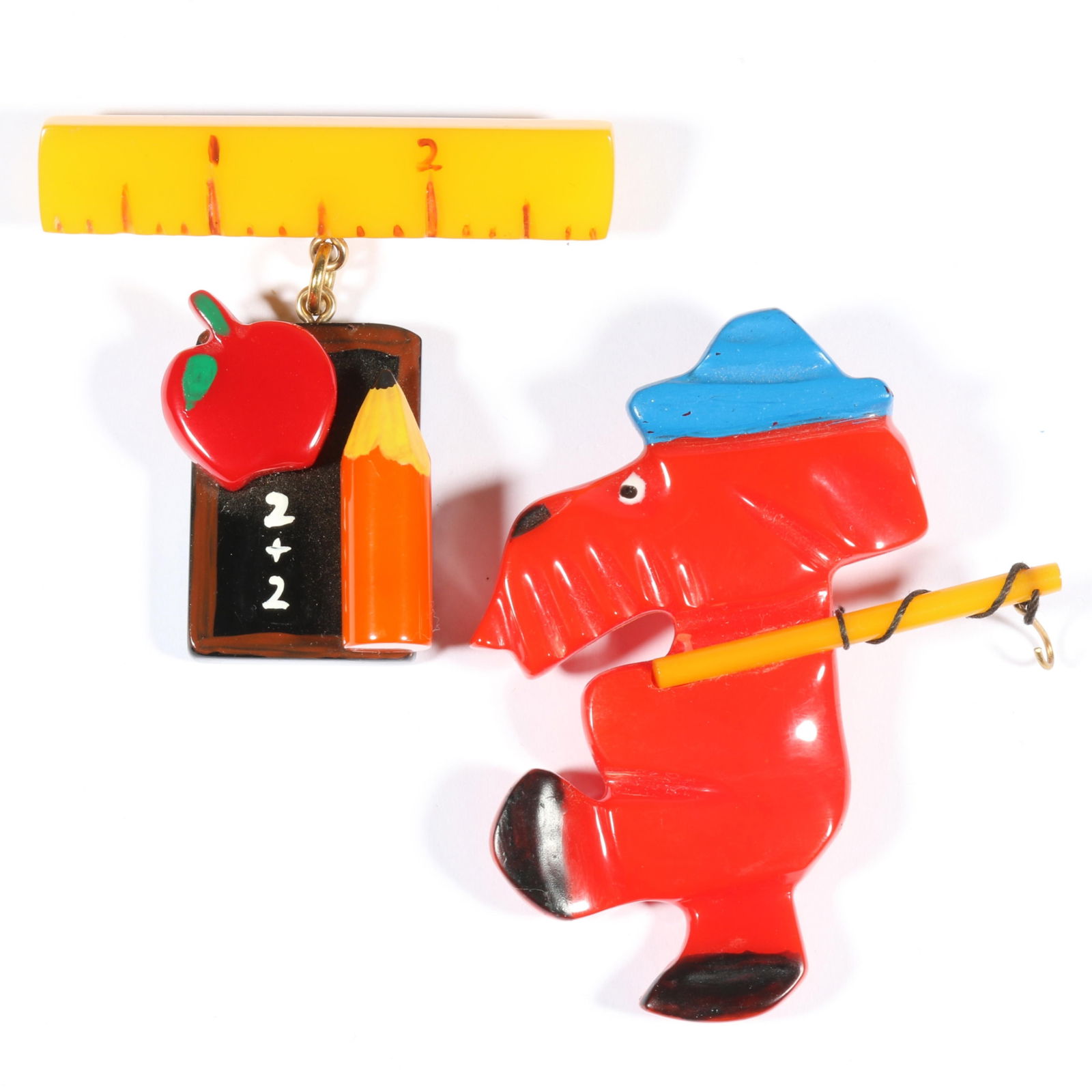 Shultz Artisan Bakelite brooches with fishing dog, and school days brooch. 3"H x 2 3/8"W (dog) (1 of 11)