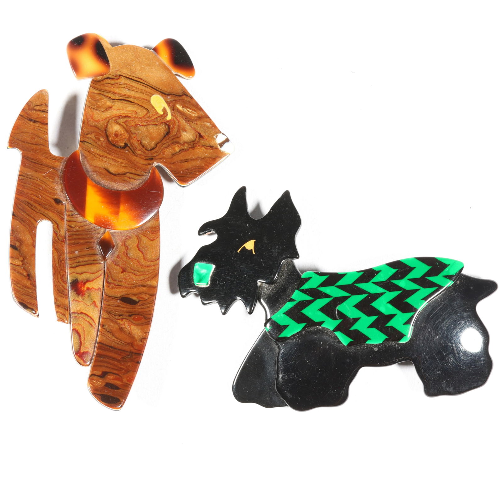 Pair of Lea Stein cellulose acetate plastic Scottie dog brooches "Ric" and "Kimdu". 3 1/2"H x 2: Pair of Lea Stein cellulose acetate plastic Scottie dog brooches "Ric" and "Kimdu". From the inventory of the former vintage costume jewelry business, "Aunt Tink", "seller of the collectible, the fun