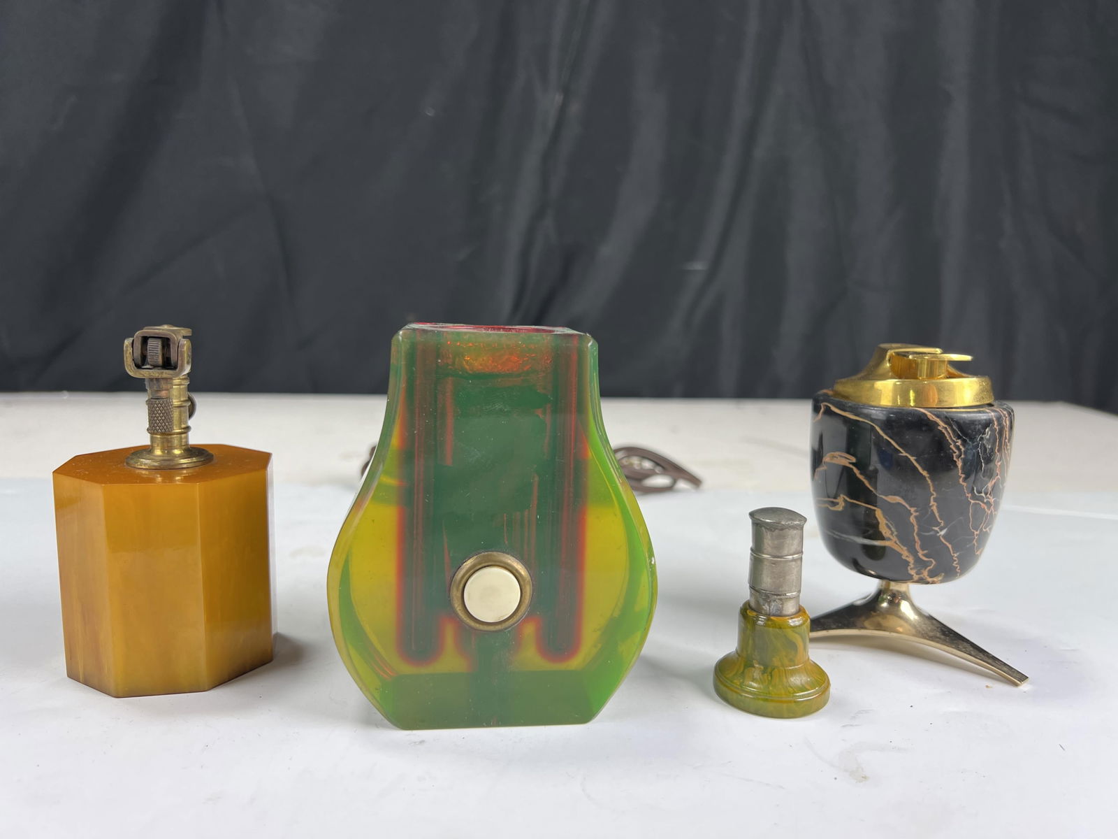 Assortment of 4 table lighters of years gone by, Bakelite, fire machines, electric, fluid, (1 of 7)
