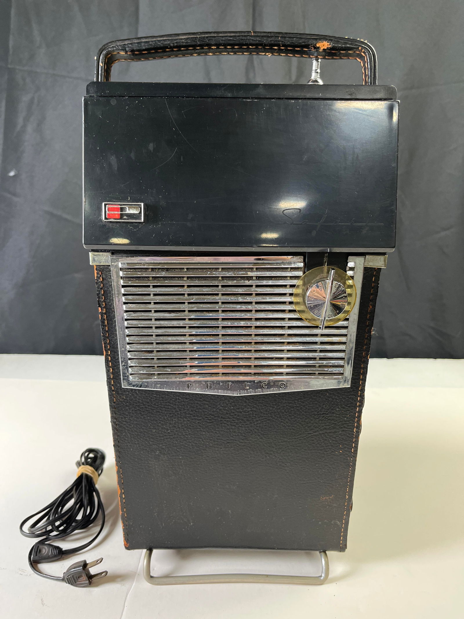 Philco model H-2010 Safari portable television with black leather cover. ?Hood? not secure, 1958-59,: Philco model H-2010 Safari portable television with black leather cover. ?Hood? not secure, 1958-59, untested