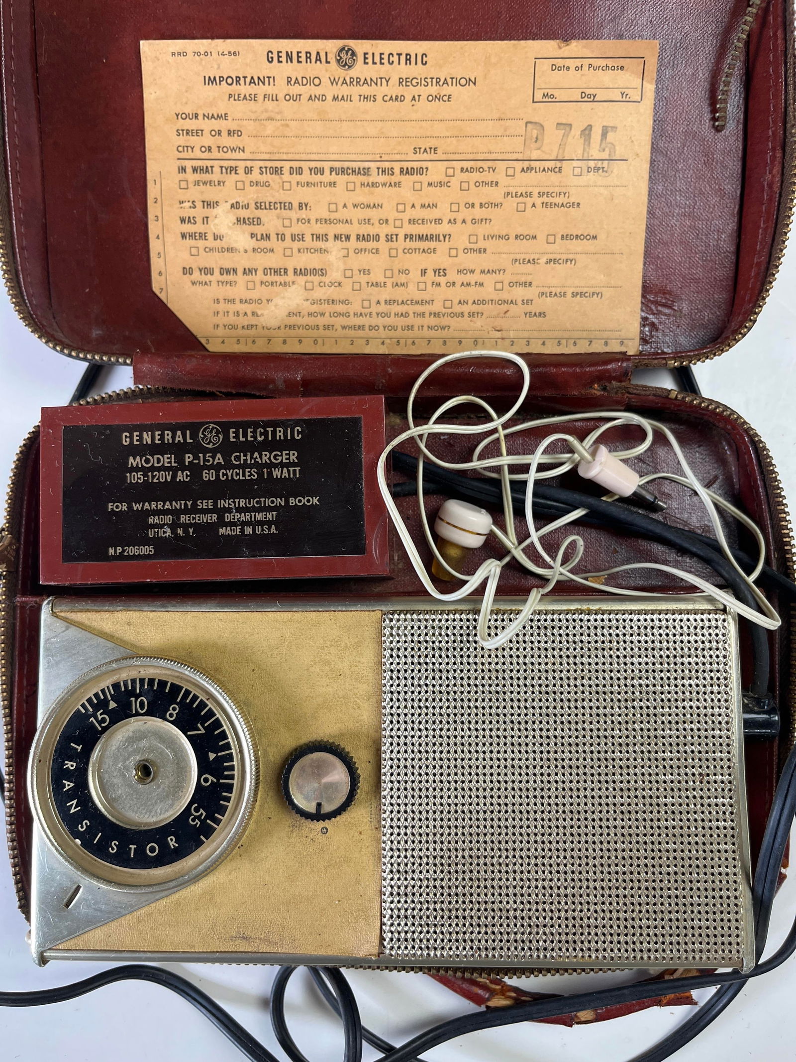 Vintage General Electric (GE) P-715 transistor radio, complete with original leather case, charger,: Vintage General Electric (GE) P-715 transistor radio, complete with original leather case, charger, headphones, and warranty card, chanel dial not secured, circa 1957-58 This is a vintage General Elec