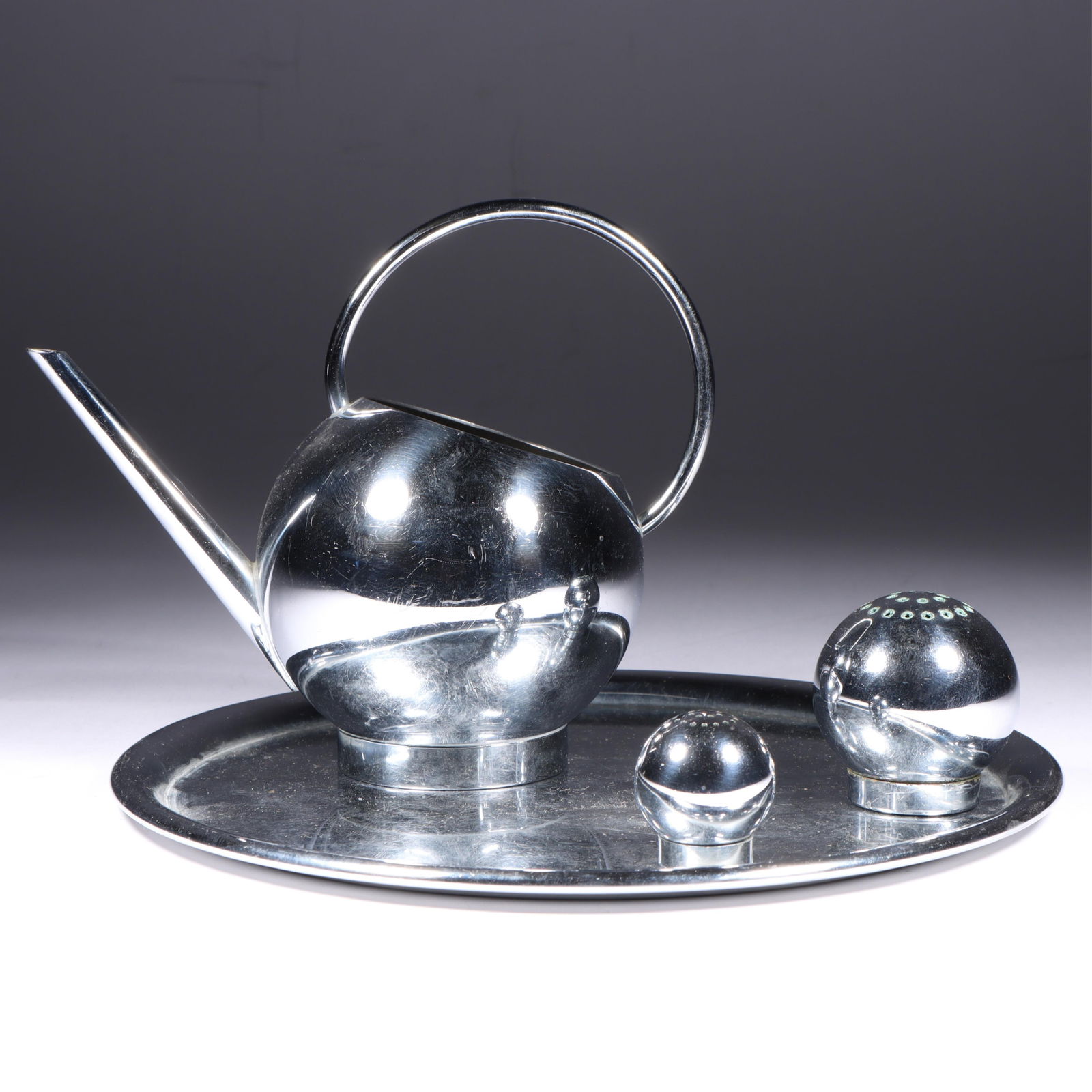 Russel Wright Art Deco Chase Chrome 4 Piece Corn Set 8"Diam. (tray): Russel Wright Art Deco Chase Chrome 4 Piece Corn Set Corn Server, Salt and Pepper shakers, and Tray, all marked w/ Chase Centaur logo. Catalog No, 28003 "This amusing four-piece set designed by Russel