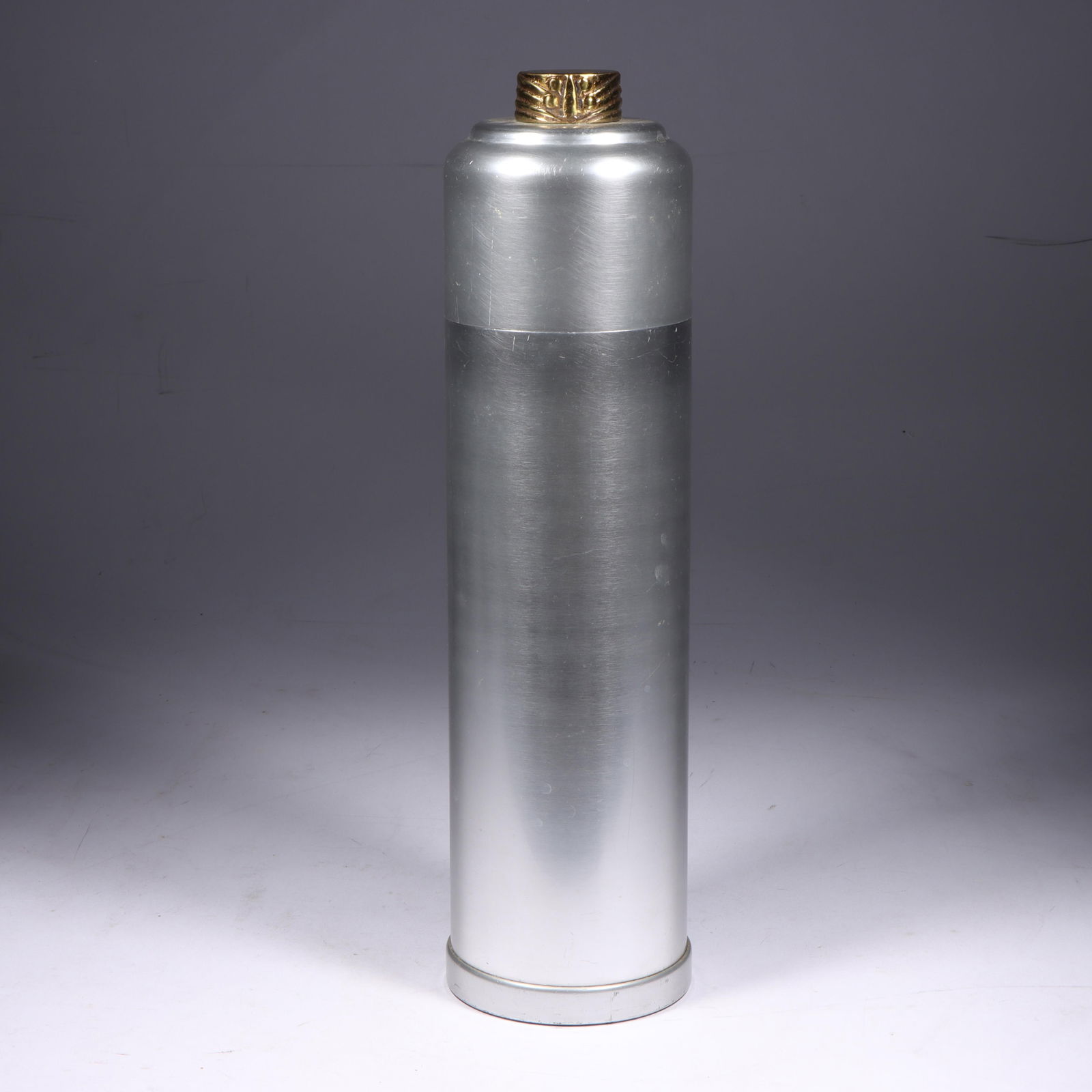 Kensington Aluminum/Brass Cocktail Shaker 13 1/2"H x: Kensington Aluminum/Brass Cocktail Shaker #7251 "Coldchester Cocktail Shaker (retail 10.00), described in fourth gift catalog: "It is high time for a Cocktail Shaker that is neither bizarre nor mid-Vi