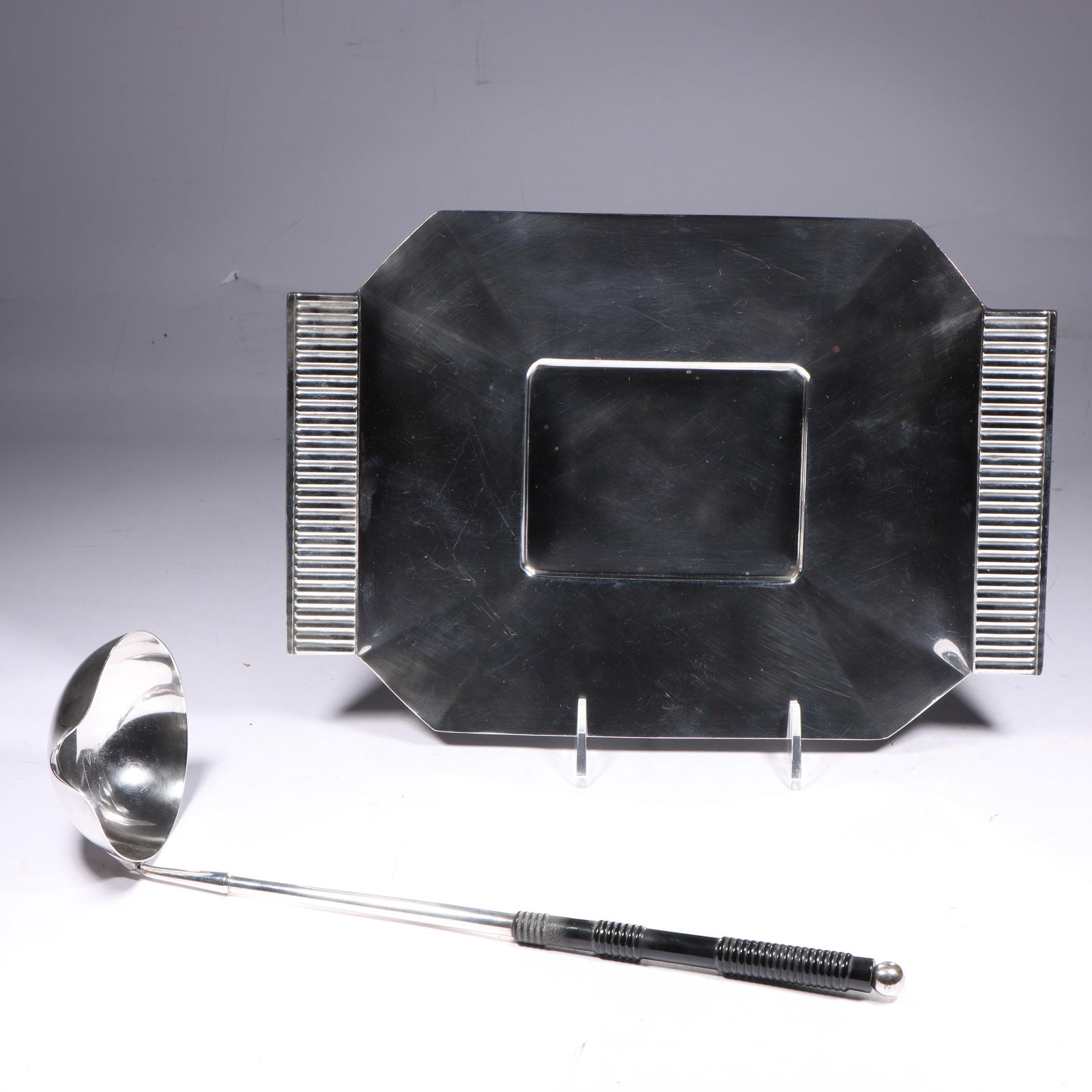 Art Deco Lurelle Guild Machine Age Silver Plated Tray & Bakelite Handled Ladle, 13"W x 9"D(Tray);: Art Deco Lurelle Guild Machine Age Silver Plated Tray & Bakelite Handled Ladle Both marked "International Giftware" with facsimile Lurelle Guild signature; Tray #5845, ladle #5644 Provenance: Charles