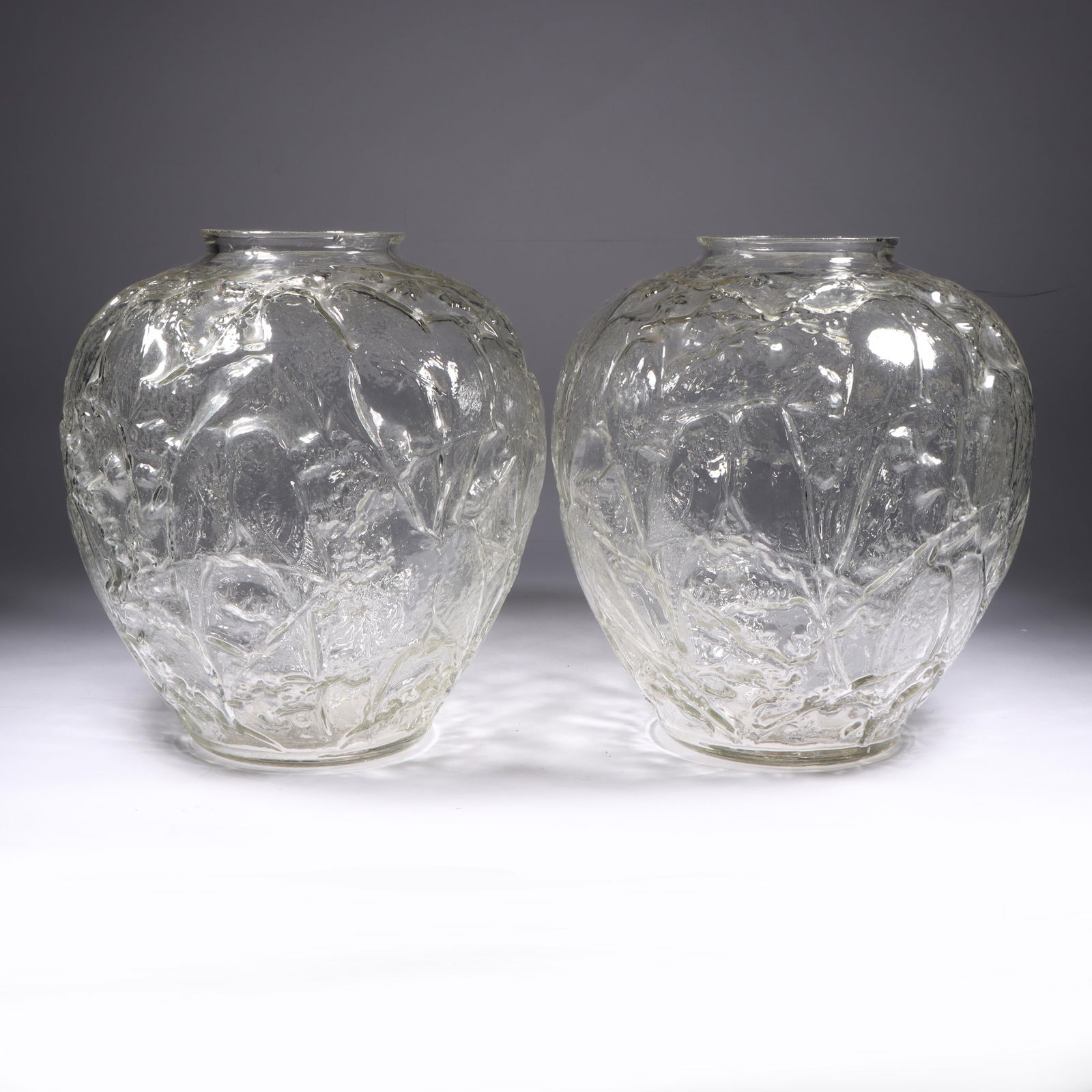 Pair of Phoenix/Consolidated Lovebirds Crystal Vases 10 1/2"H x 9 1/4"Diam. (one): Pair of Phoenix/Consolidated Lovebirds Crystal Vases Based on the Lalique Les Perruches model. Provenance Charles Alexander, Indianapolis, IN 10 1/2"H x 9 1/4"Diam. (one)