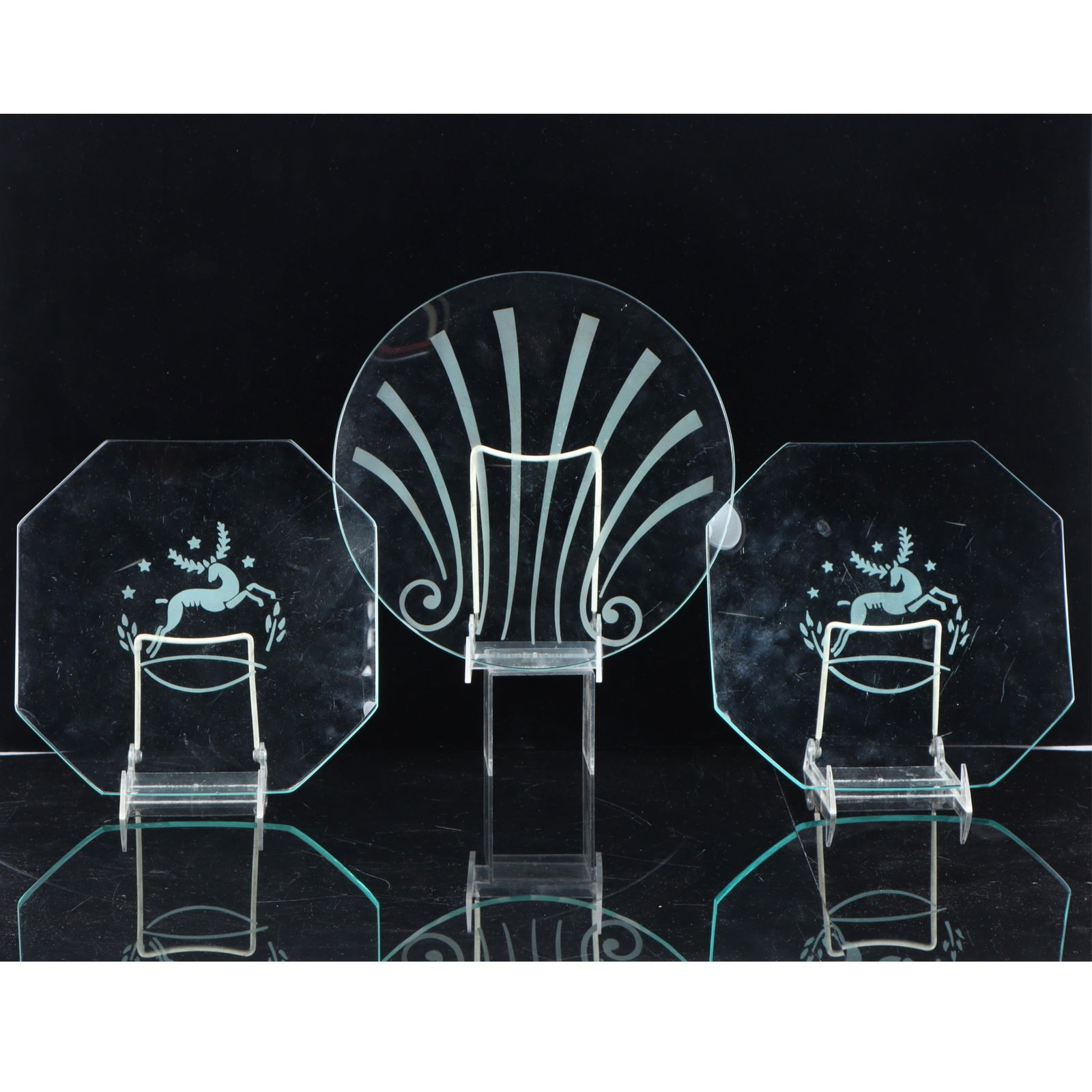 Kensington Lurelle Guild 3 Bent Glass 10? Plates 10"Diam.: Kensington Lurelle Guild 3 Bent Glass 10? Plates Two Kensington bent glass #7919" Octagonal Stag plates with a #7925 Shell plate, all with etched designs. Not pictured in any book. Provenance: Charles