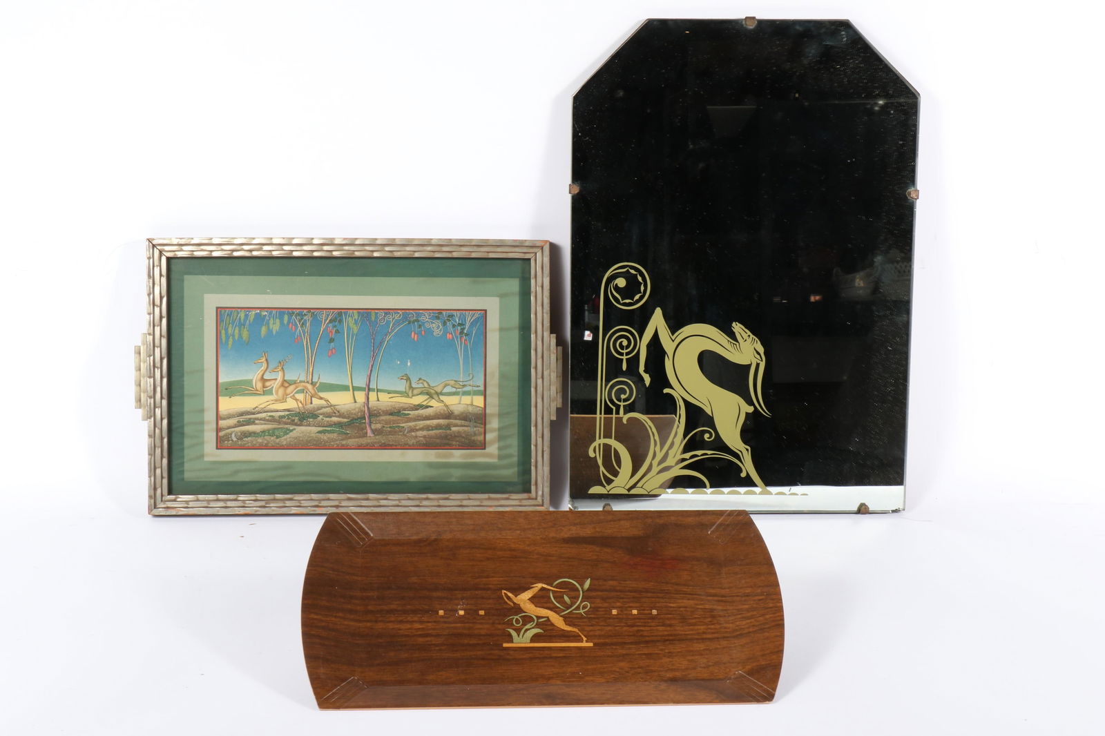 Art Deco Leaping Stag Motif Mirror and Two Trays 20"H x 14"W (Mirror): Art Deco Leaping Stag Motif Mirror and Two Trays Three Leaping Stag motif items. Mirror manufactured by Porter Mirror & Glass, Shelbyville, In; a Hasko Haskelite Tray w/ leaping stag motif: and a silv