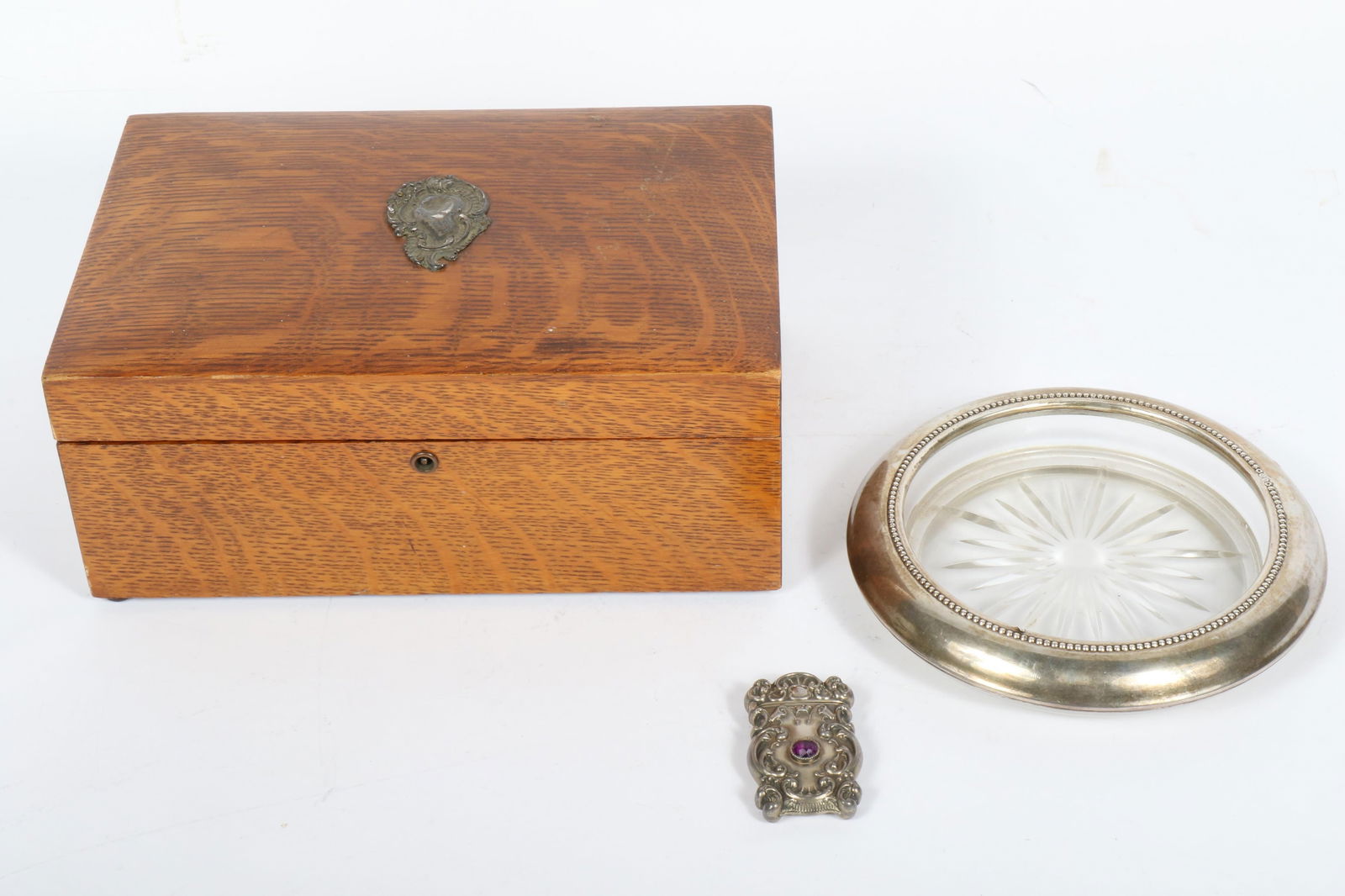 Victorian oak cigar humidor box with applied decoration, Victorian sterling silver scrolling: Victorian oak cigar humidor box with applied decoration, Victorian sterling silver scrolling repousse match safe with purple jewel, sterling silver and crystal wine bottle coaster 4 1/4"H x 10"W x 6 3