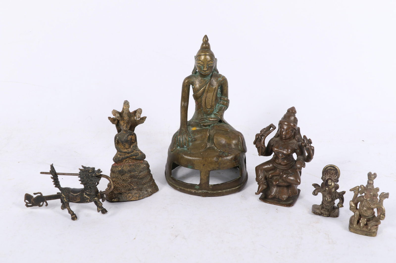 6pc. collection of miniature brass sculptures featuring Southeast Asian deities and figures:: 6pc. collection of miniature brass sculptures featuring Southeast Asian deities and figures: Mandalay Burmese bronze Buddha, Ganesh pilgrimage figures, Kylin figural lock, Mandalay Burmese Bronze Budd