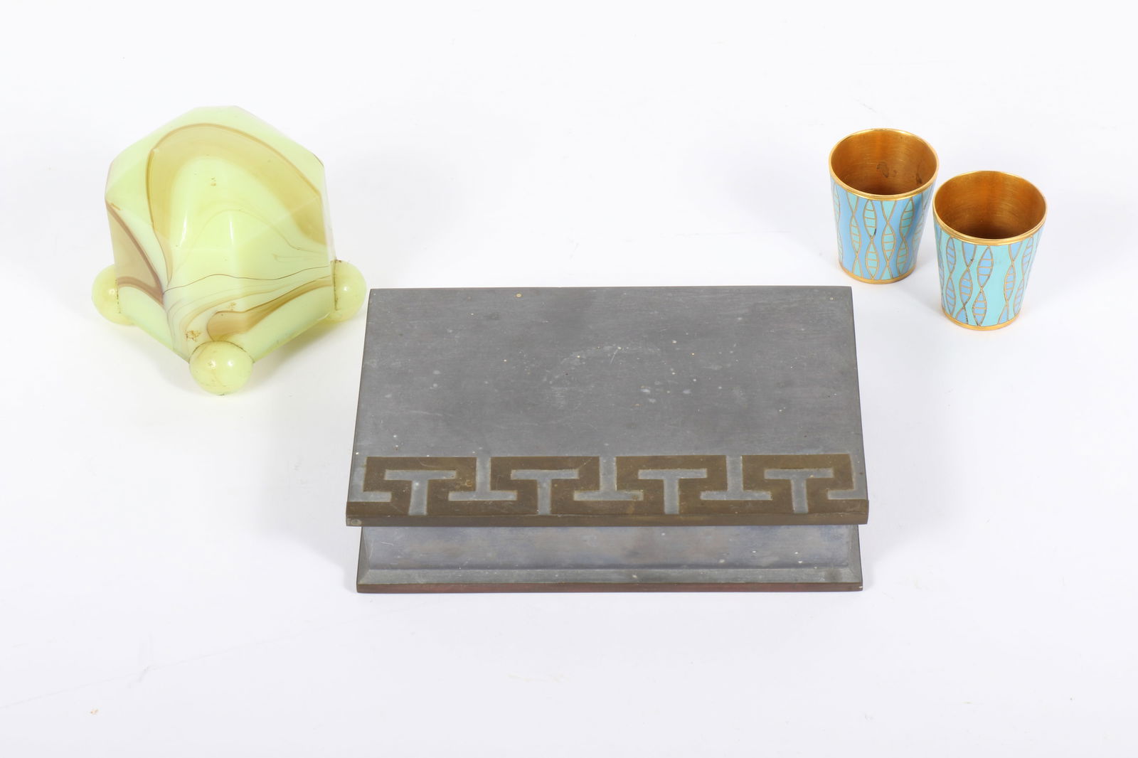 Decorative object 4pc. group: Art Deco uranium slag glass cigarette lighter, USSR Russian cloisonn: Decorative object 4pc. group: Art Deco uranium slag glass cigarette lighter, USSR Russian cloisonn? vodka shot glasses, and Greek key pattern trinket/jewelry box 1 1/4"H x 6"W x 4"D (Largest)