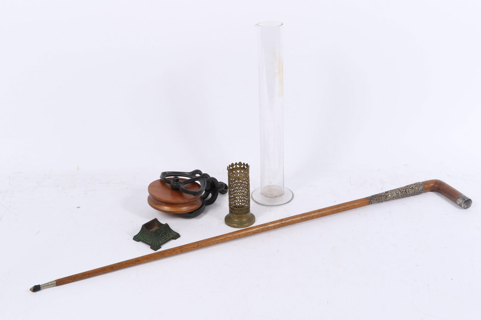 Antique / vintage group, 5pc: cane walking stick with sterling silver floral decoration, cast iron: Antique / vintage group, 5pc: cane walking stick with sterling silver floral decoration, cast iron and wood barn pulley, graduated cylinder laboratory glass, cane, Vantine's Model 473 cone incense bur