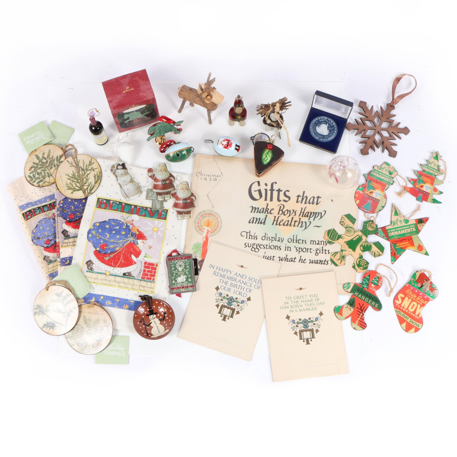 Assorted Christmas collectibles, featuring two N.C. Wyeth holiday cards, c. 1923 14"H x 8"W (one: Assorted Christmas collectibles, featuring two N.C. Wyeth holiday cards, c. 1923 14"H x 8"W (one towel)
