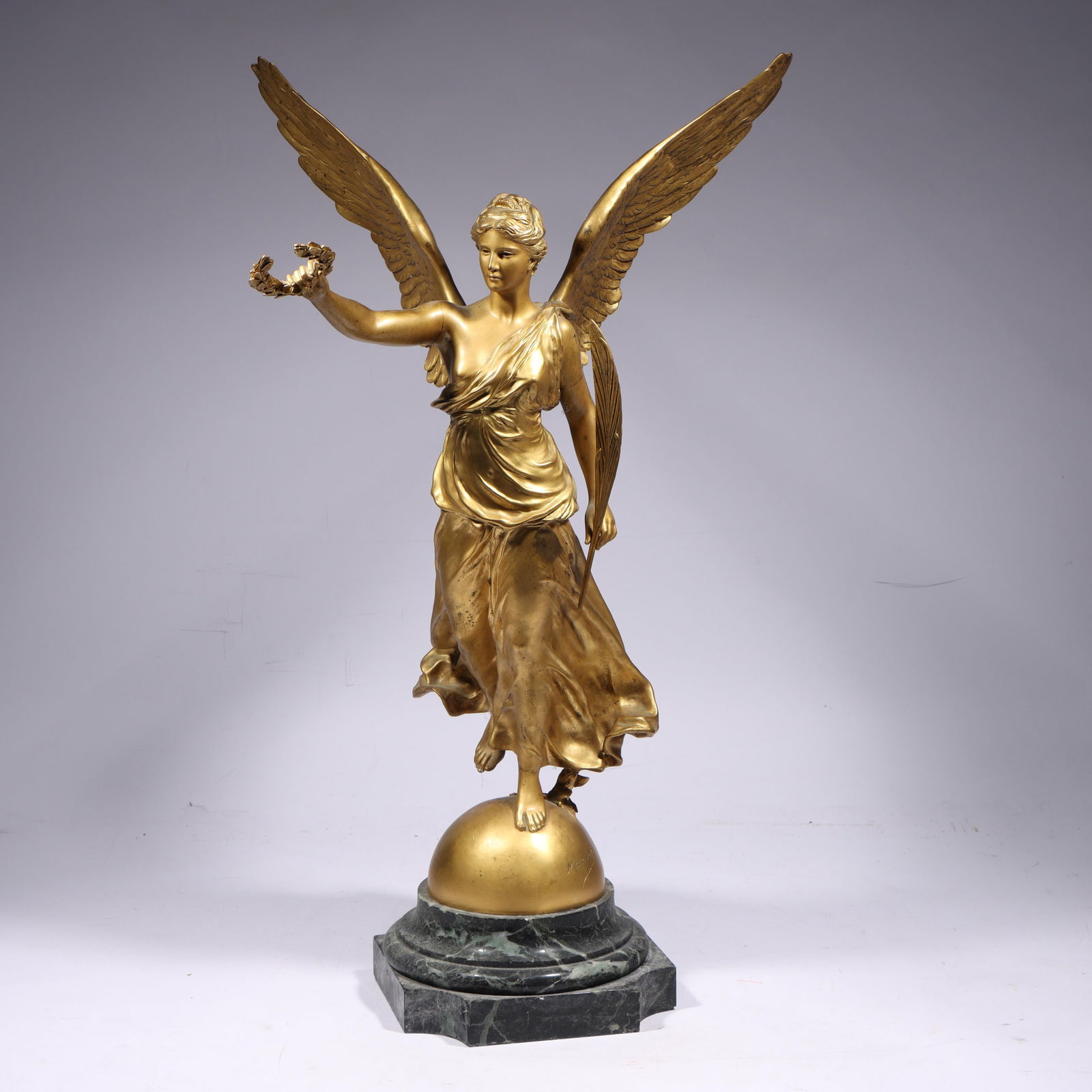 Laurent-Honore Marqueste, French (1848 - 1920), Barbedienne Winged Victory, gilt dore bronze on: Laurent-Honore Marqueste French (1848 - 1920) Barbedienne Winged Victory gilt dore bronze on marble base Signed on base. Ferdinand Barbedienne (1810 - 1892) foundry. Base loose. 25 1/2"H x 12 1/2"W