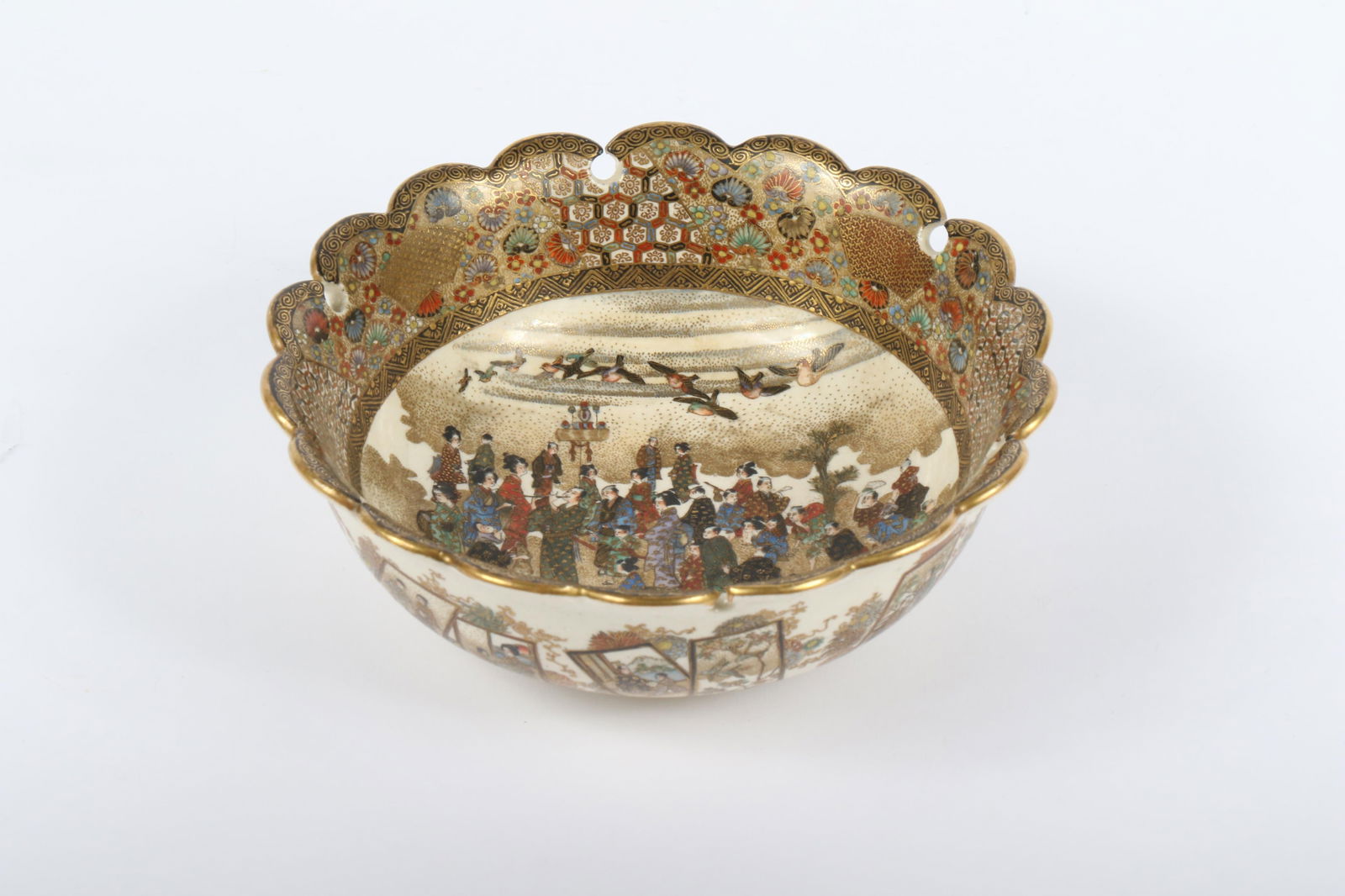 Antique Japanese polychrome Satsuma bowl, Meiji period. 2 1/4?H x 6?Diam.: Antique Japanese polychrome Satsuma bowl, Meiji period. Scalloped keyhole rim. Celebration scene with ducks flying overhead in basin. Exterior decorated with framed scenes. 2 1/4?H x 6?Diam.