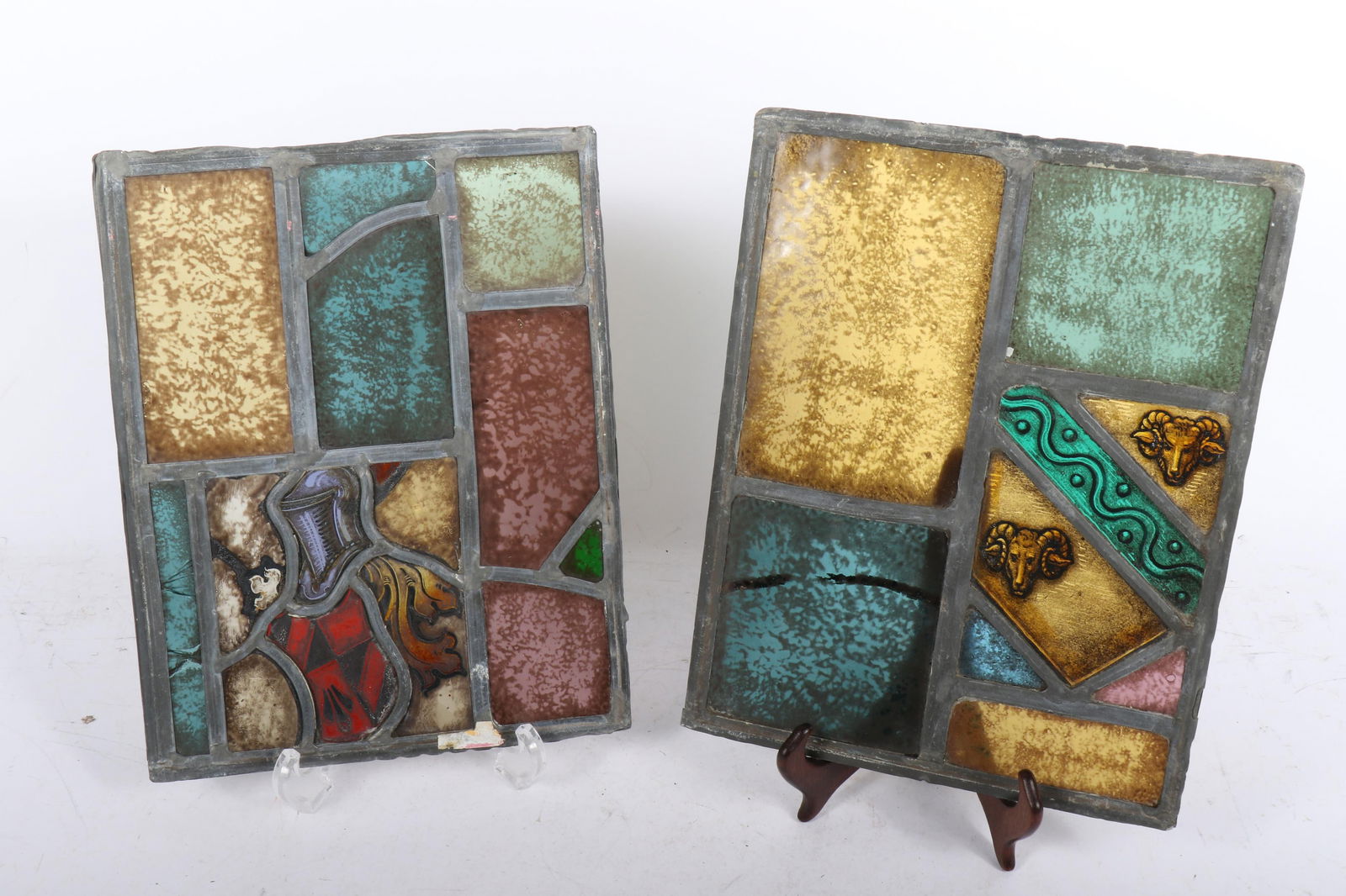 Pair antique leaded stained glass panels with heraldic symbols: knights shield and helmet, ram's (1 of 12)