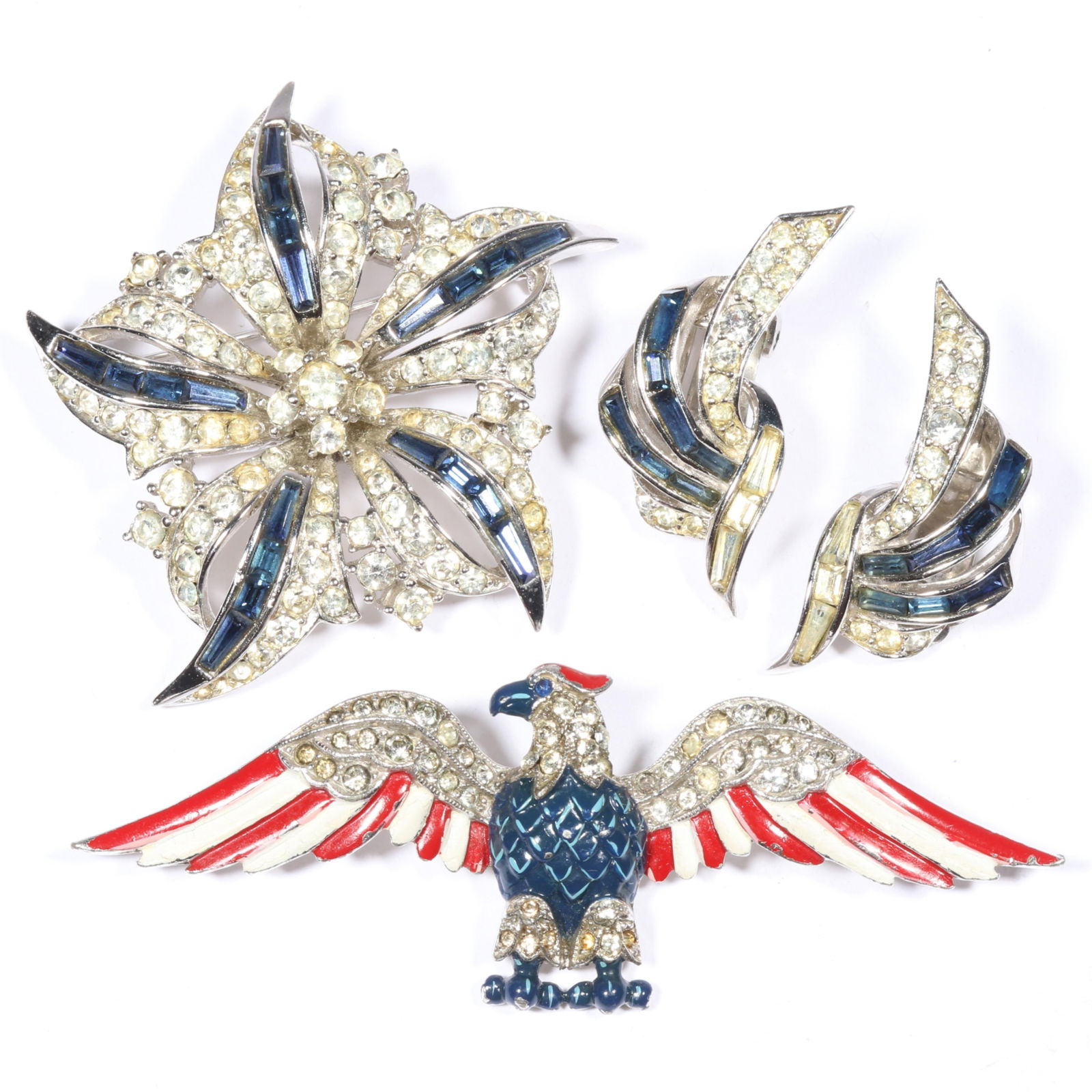 Trifari Patriotic Eagle brooch with enamel and pave, and Boucher rhinestone crystal pinwheel brooch: Trifari Patriotic Eagle brooch with enamel and pave, and Boucher rhinestone crystal pinwheel brooch and matching earrings 1 7/8"H x 1 3/4"W (Boucher)