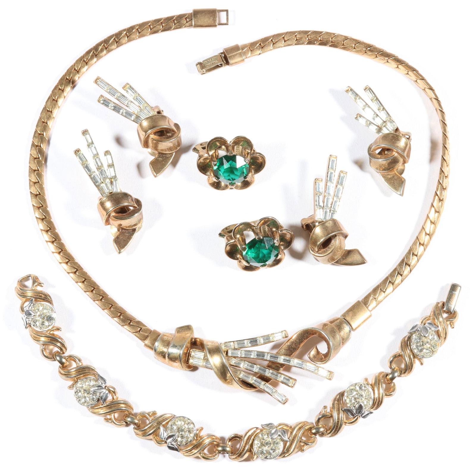 Crown Trifari retro 5pc jewelry group including spray necklace with two pairs of matching earrings,: Crown Trifari retro 5pc jewelry group including spray necklace with two pairs of matching earrings, rhinestone fruit bracelet, and floral green crystal earrings. Light wear to gold tone. Provenance: F