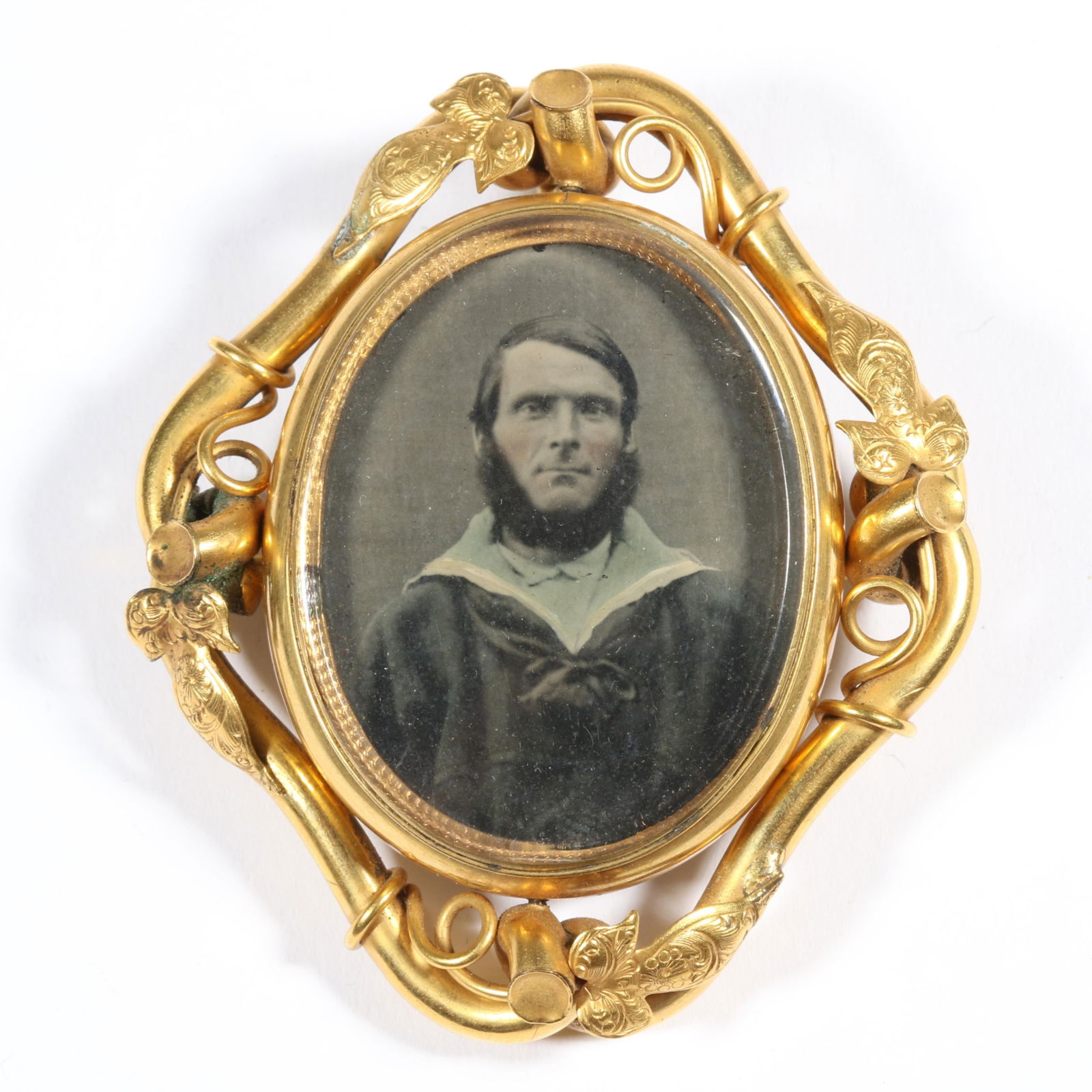 Antique Victorian double sided locket pendant swivel brooch with hand tinted tintype photo and: Antique Victorian double sided locket pendant swivel brooch with hand tinted tintype photo and fabric on the other side. Provenance: From the collection of Sue Rudman, owner of Antique Source, Ltd in