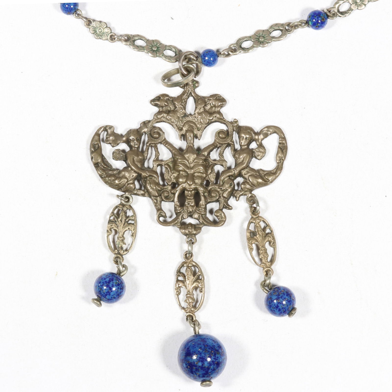 Antique 800 silver Peruzzi Mythology themed Satyr and Cherub long pendant necklace with Lapis art: Antique 800 silver Peruzzi Mythology themed Satyr and Cherub long pendant necklace with Lapis art glass beads, unsigned. From the inventory of the former vintage costume jewelry business, "Aunt Tink",