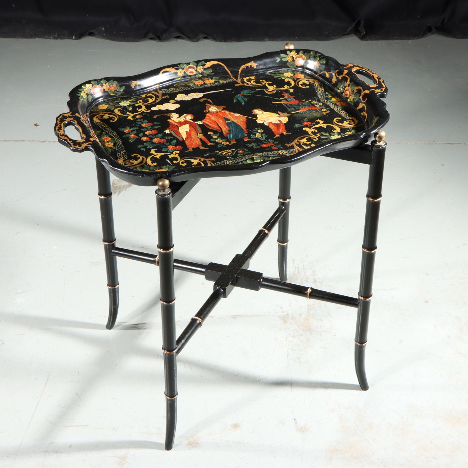 19th century black lacquer Chinoiserie papier / paper mache tray table with hand-painted gilt: 19th century black lacquer Chinoiserie papier / paper mache tray table with hand-painted gilt landscape and bamboo style legs 21 1/2"H x 22"W (tray on stand)