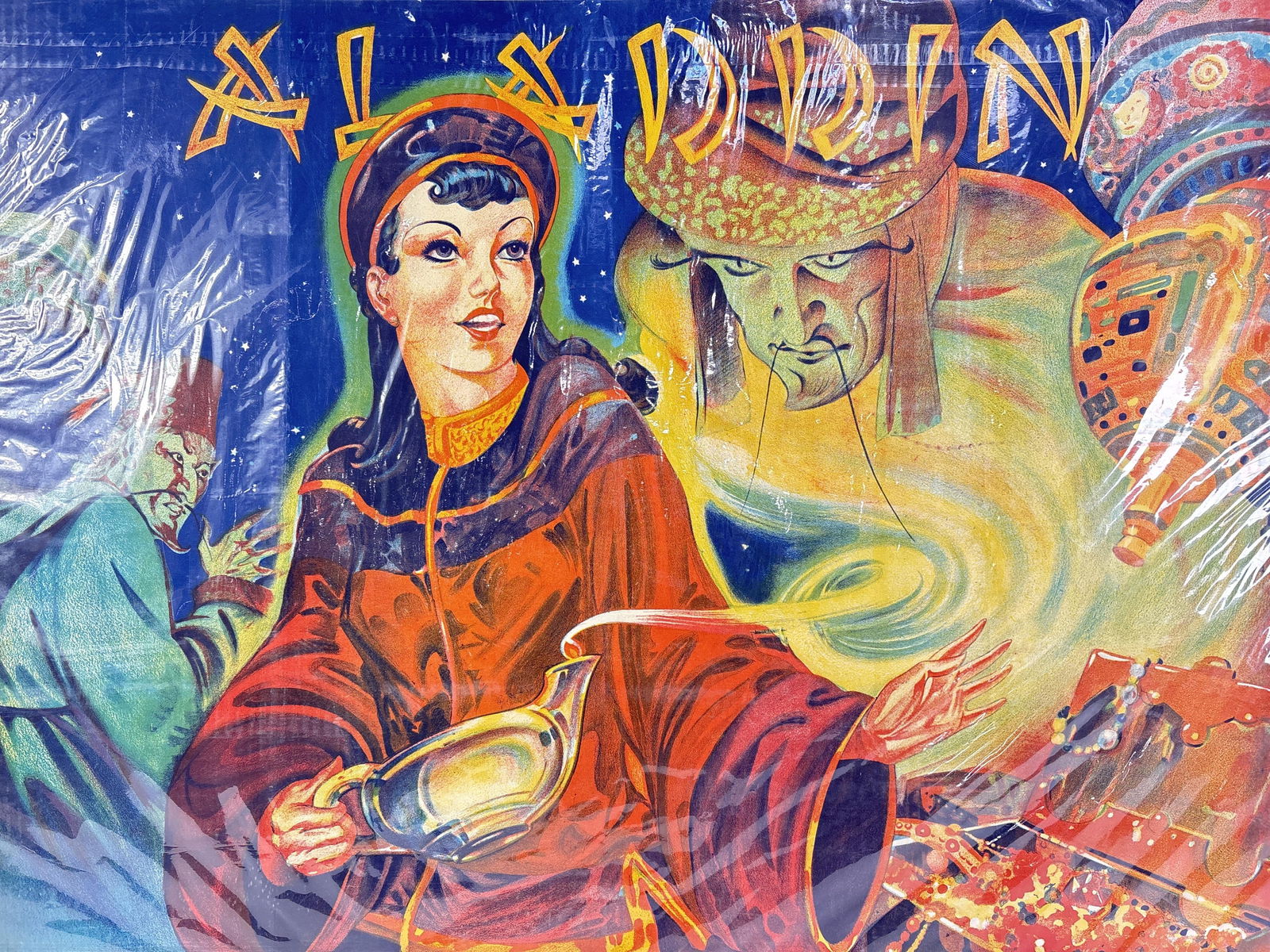 Vintage Aladdin pantomime theater poster, c. 1930s 39 1/2"W X 30"H: Vintage Aladdin pantomime theater poster, c. 1930s Poster is plastic wrapped to cardboard, but is not adhered to it. Printed by Taylors of Wombwell, Yorkshire. 39 1/2"W X 30"H